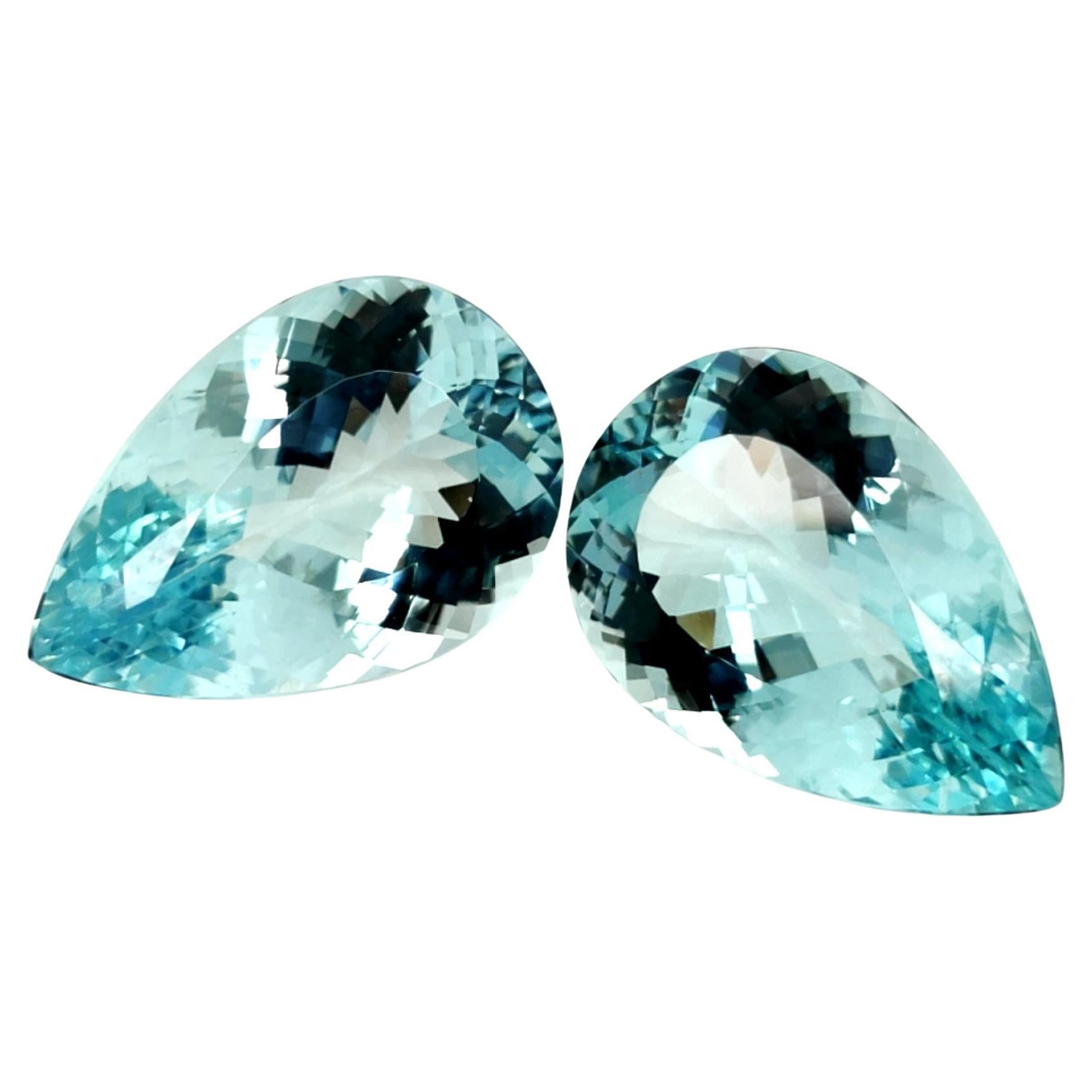 Paraiba Tourmaline Set 24.01 Carat & 24.45 Carat Pear Flawless Loose Gemstones For Sale