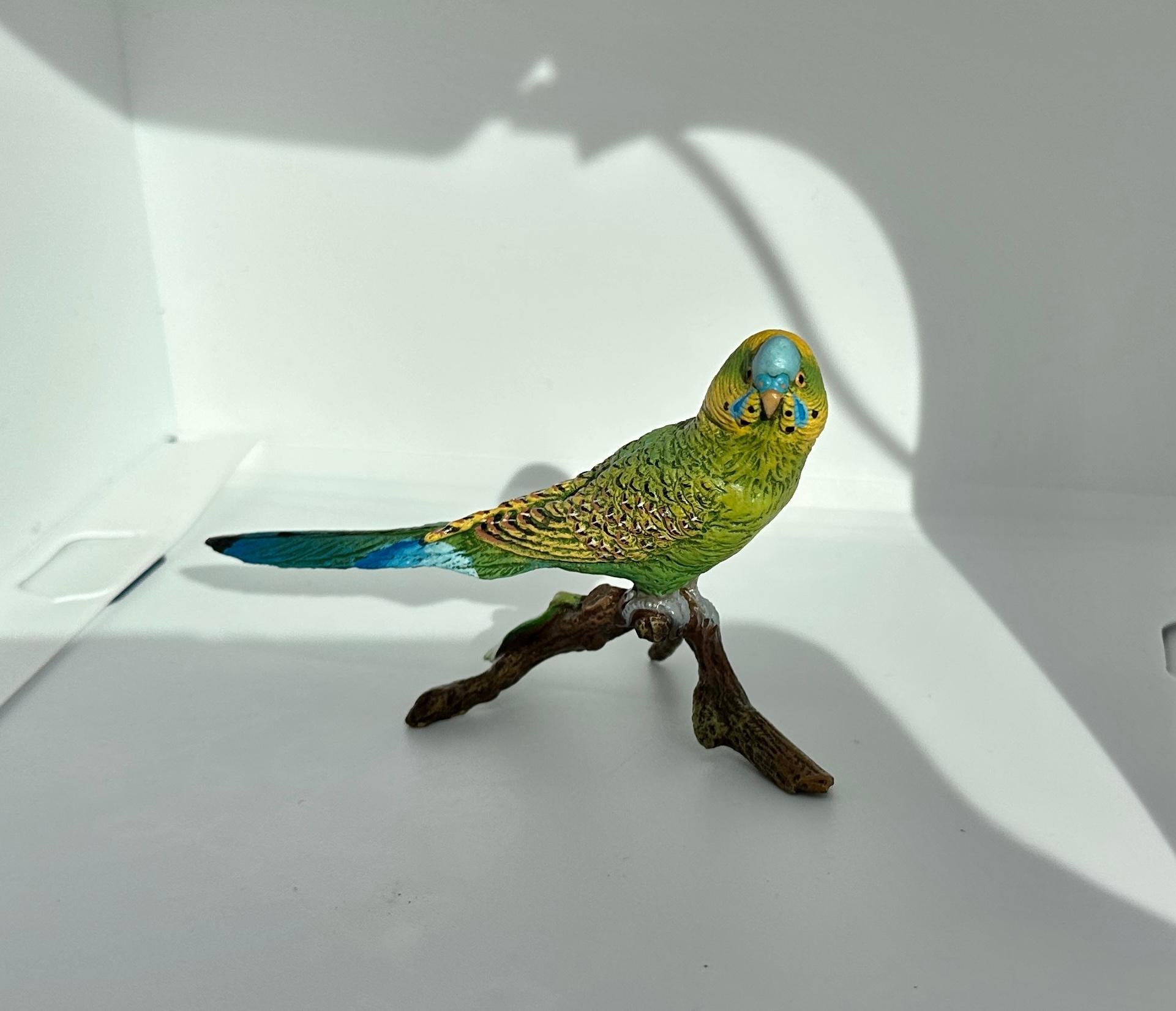 THIS IS A SUPERB AUSTRIAN VIENNA BRONZE OF A PARAKEET BIRD ON A BRANCH SIGNED WITH THE BERGMAN MARK.
This wonderful antique Austrian Vienna Bronze (Bronze de Vienne, Wiener Bronze, Cold Painted Bronze) is so charming with its yellow-green and blue