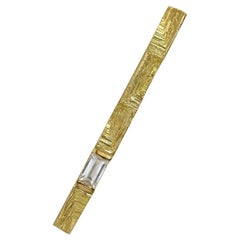 Modernistische Statement-Brosche aus Gold mit Parallax im Baguetteschliff 0,3 Karat Diamant
