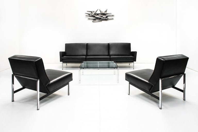 The Model 51, beter known as the Parallel Bar series with a brushed chrome and black finish steel frame were designed by Florence Knoll in 1955 for Knoll International.

This set, existing of a large sofa and two slipper chairs were produced under
