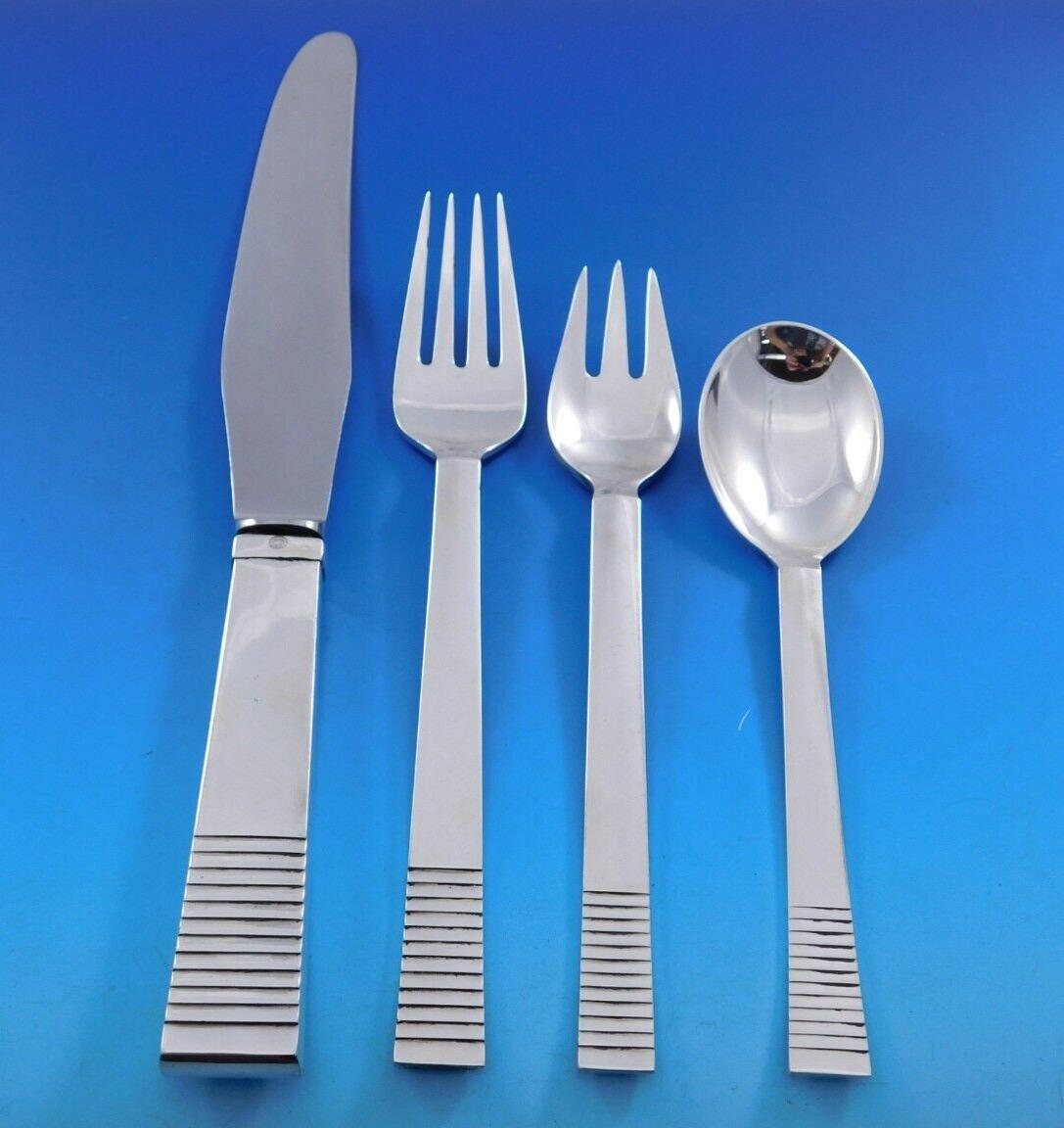 Georg Jensen Sterling Silver “Parallel” AKA “Relief” flatware. Designed by Oscar Gunlach-Pedersen, for Georg Jensen's Silversmithy 1931. Gunlach-Pedersen trained as a sculptor and architect. Between 1927-31 he was the director of the A/S Georg