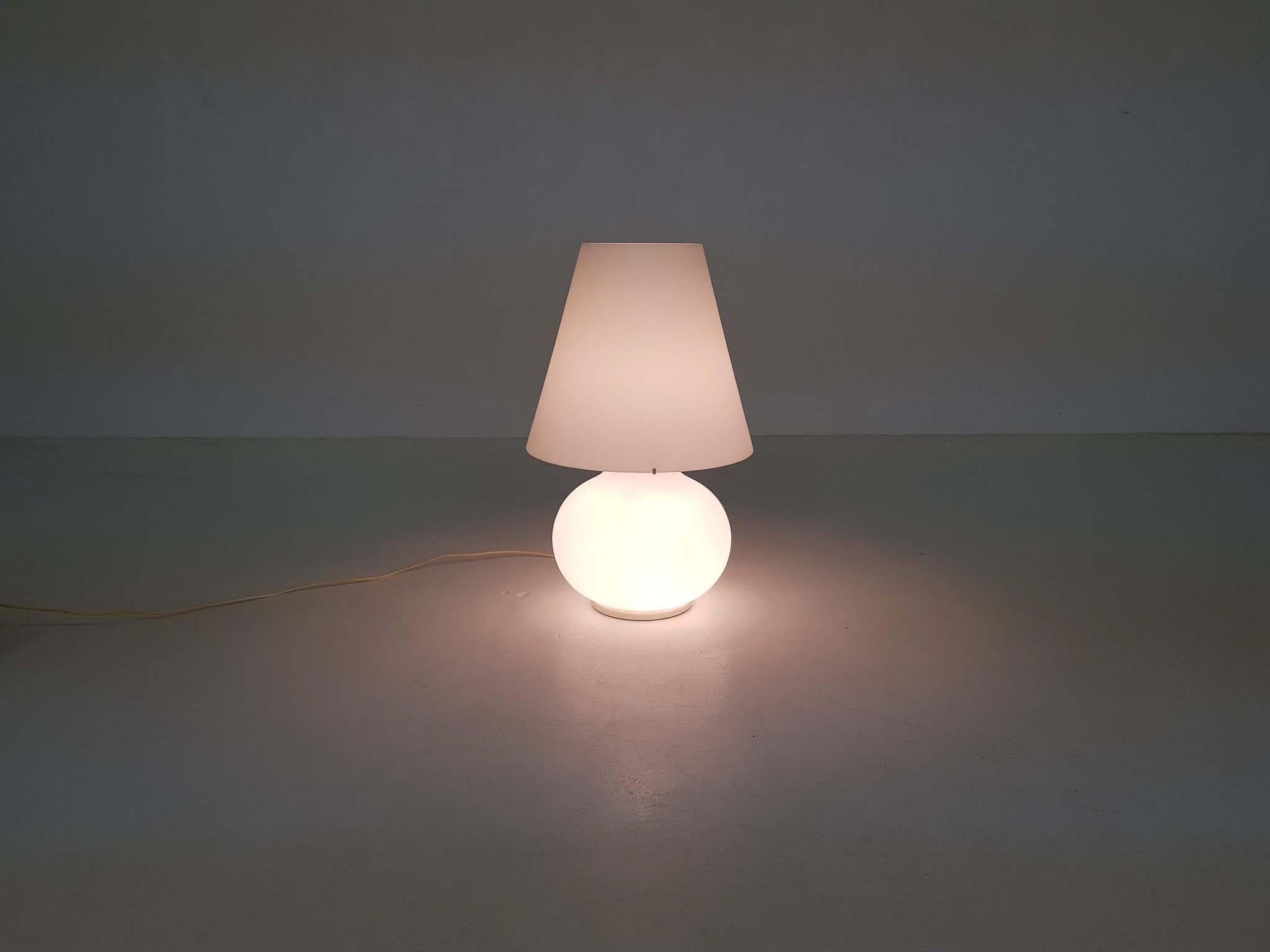 Paralume, Murano Due, “Ufficio Stile” Large glass table light, Italy
Large white milk glass table lamp with two light bulbs, one in the feet and one under the glass shade.