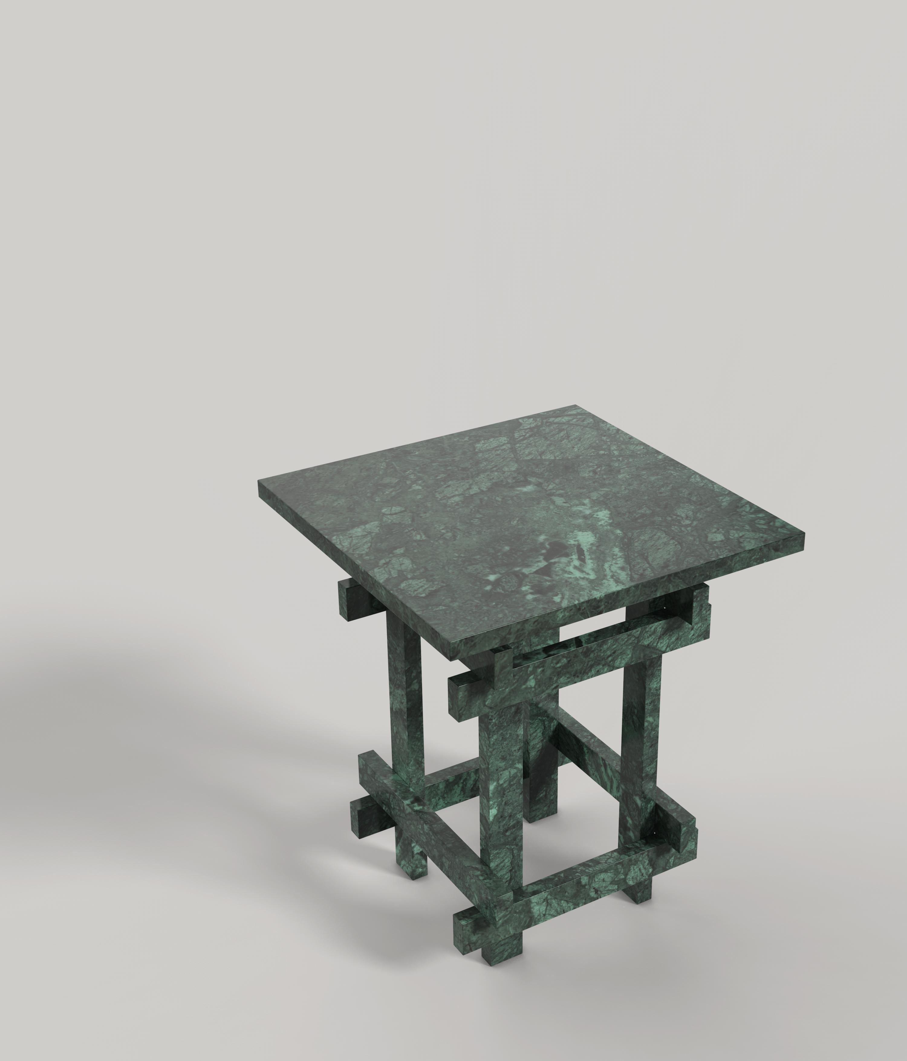 Paranoid V1 is a 21st Century sculptural side table made by Italian artisans in green Guatemala marble. The piece is manufactured in a limited edition of 150 signed and progressively numbered examples. It is part of the collectible design language