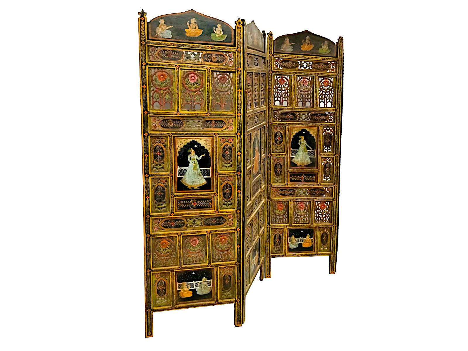 Early 20th century Indian screen
Early twentieth-century Indian screen, polychrome.
India partition, composed of four hand-painted panels. 
Richly decorated with fretwork and hand-painted depicting Indian noble characters, Maharaja