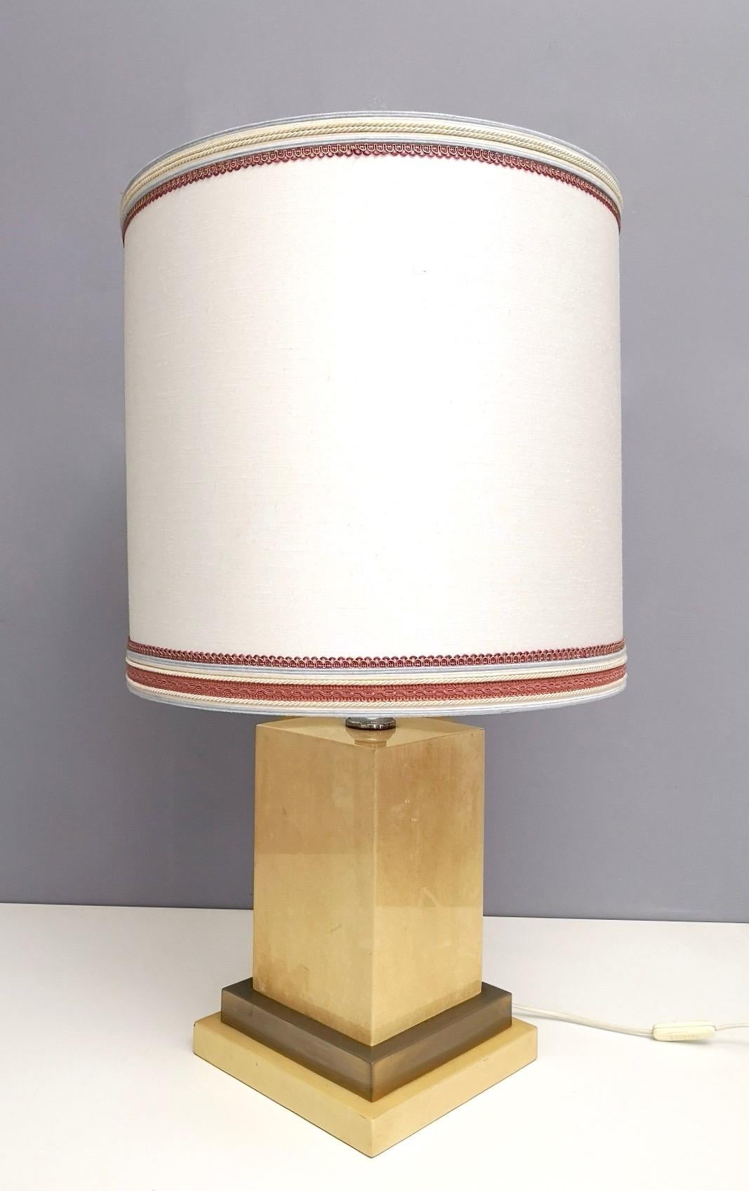 Mid-20th Century Parchment and Brass Table Lamp by Aldo Tura, Italy 1960s-1970s