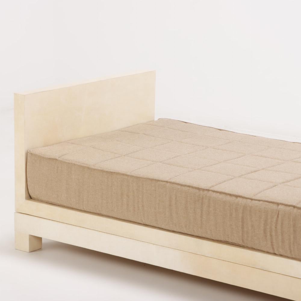 Mid-Century Modern Parchment covered daybed in the manner of Jean-Michel Frank.