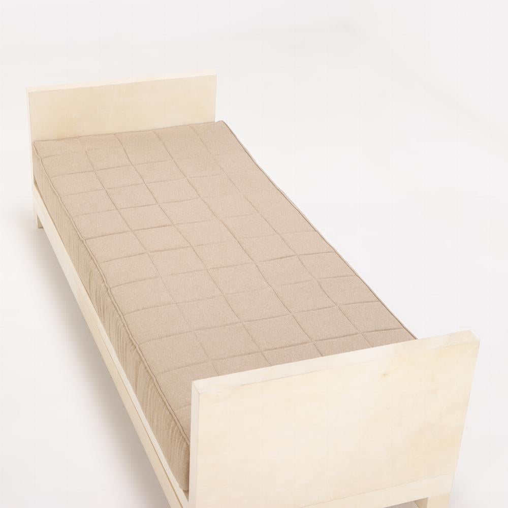 Parchment covered daybed in the manner of Jean-Michel Frank. In Good Condition In Philadelphia, PA