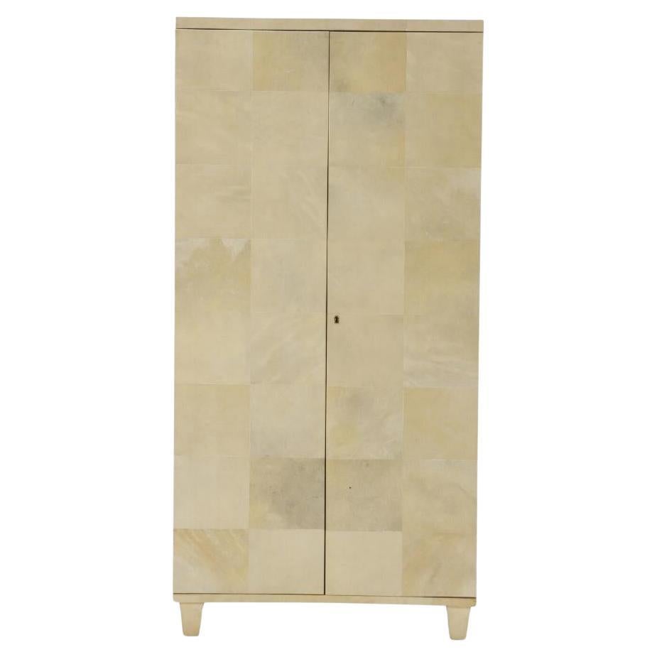 Parchment covered two door cabinet C 1940 in the manner of Samuel Marx.  For Sale