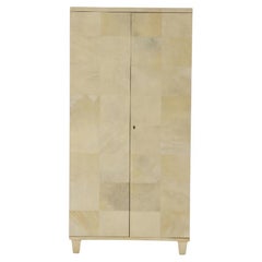 Parchment covered two door cabinet C 1940 in the manner of Samuel Marx. 