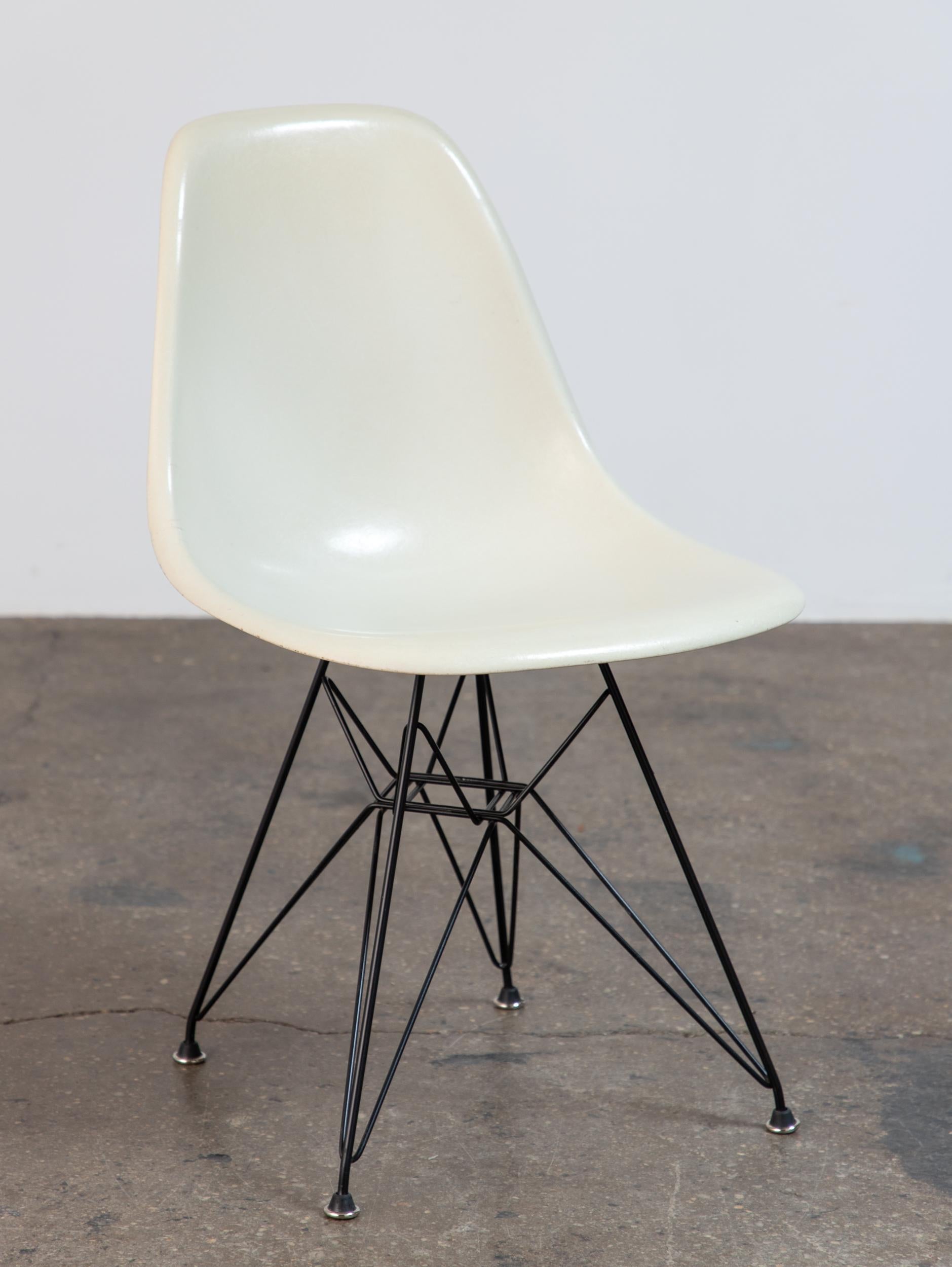 Multiple Available. Original Molded Fiberglass Shell Chair, designed by Charles and Ray Eames for Herman Miller. Vintage shell chairs are prized for their attractive patina, distinct thread texture and beautiful depth of color seen in the fiberglass