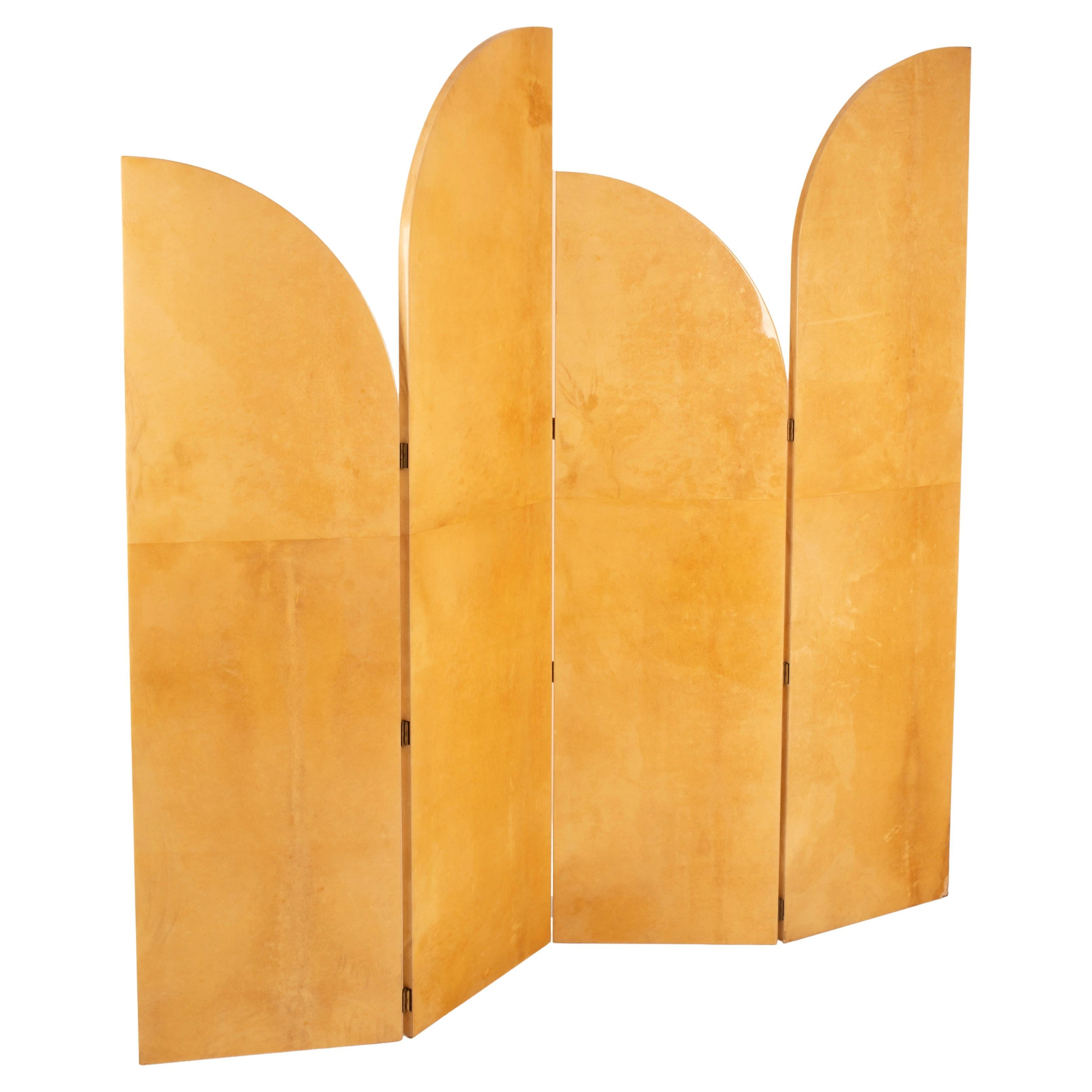 An authentic masterpiece by Aldo Tura, this exceptional four-panel screen from the 1960s is one of the rarest and most elegant expressions of postwar Italian decorative design.
Entirely clad front and back in hand-dyed natural parchment in