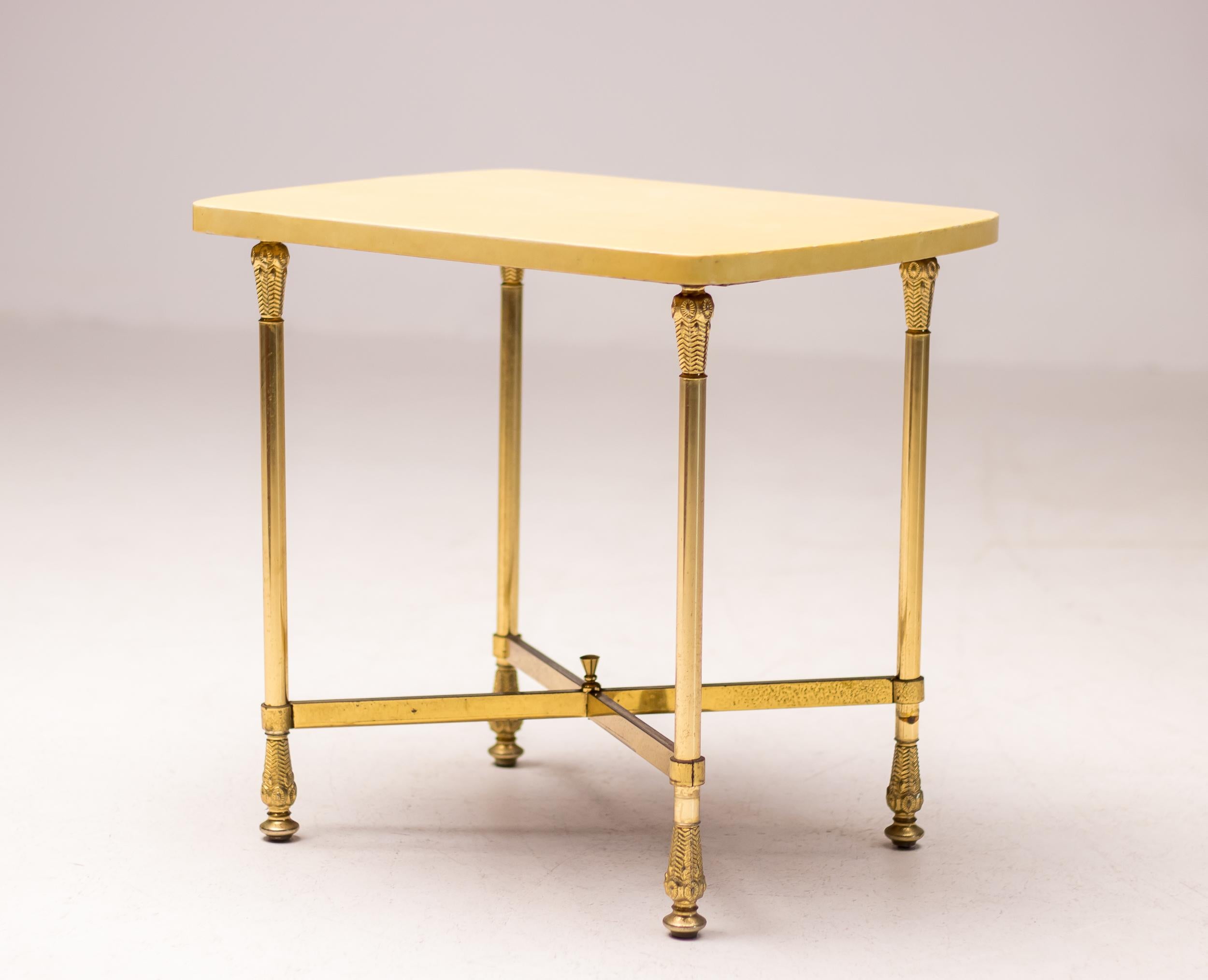 Wonderful side table designed by Aldo Tura, Italy, circa 1965.
Trademark lacquered goatskin parchment with legs in brass.
The superior craftsmanship is a hallmark of Aldo Tura.
Most 'attributed to Aldo Tura' items on the market are not labeled.
An