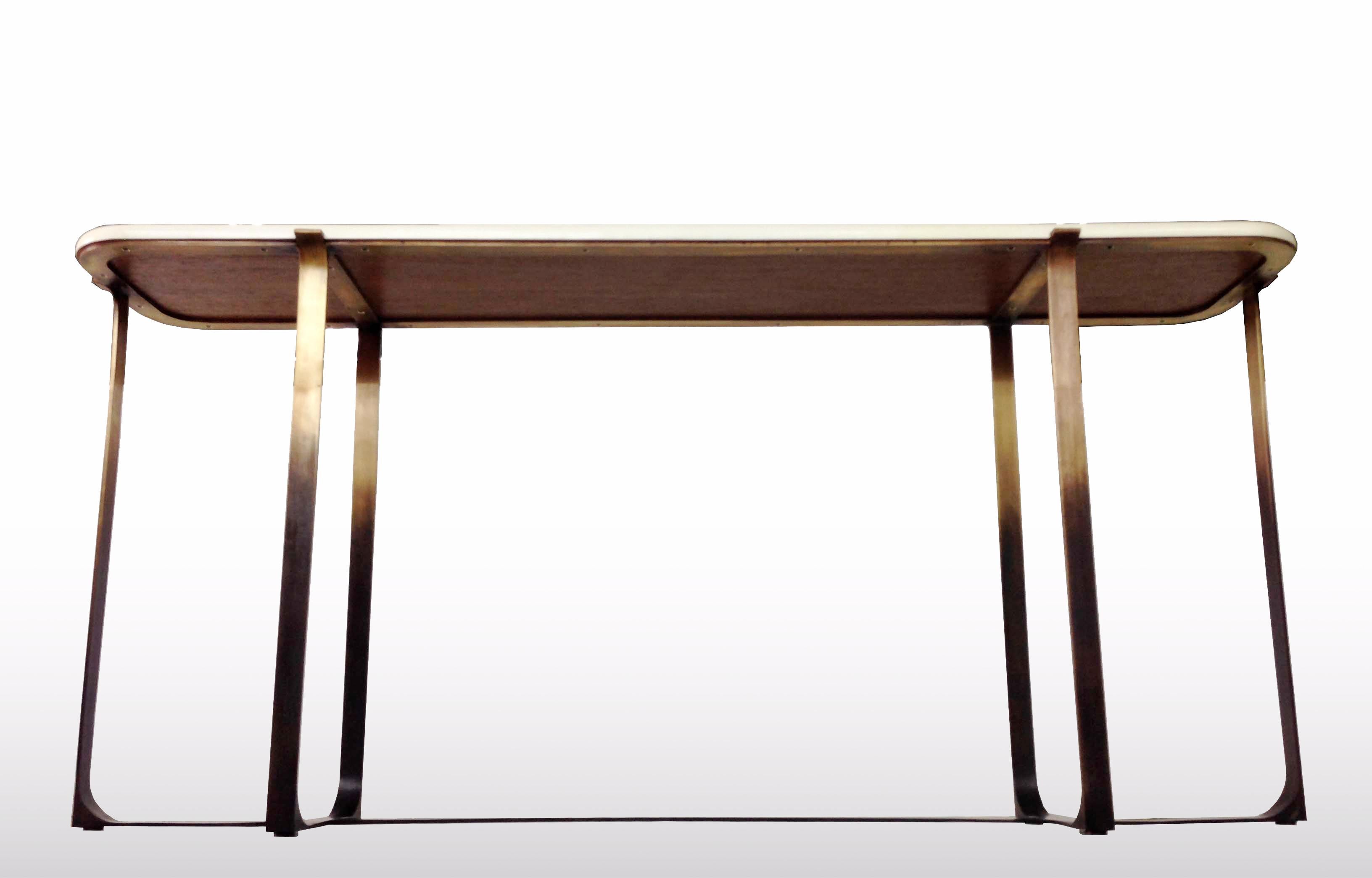 The arch console table has a parchment top and a gradually darkening ombre base in cast bronze. 
Custom sizes and finishes are available.