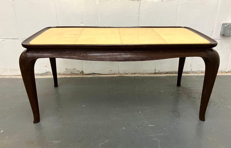 Elegant low cocktail table with natural goatskin tiles on top, and beautifully carved base and figured legs. Unsigned but exceptionally well made table attributed to Borsani.