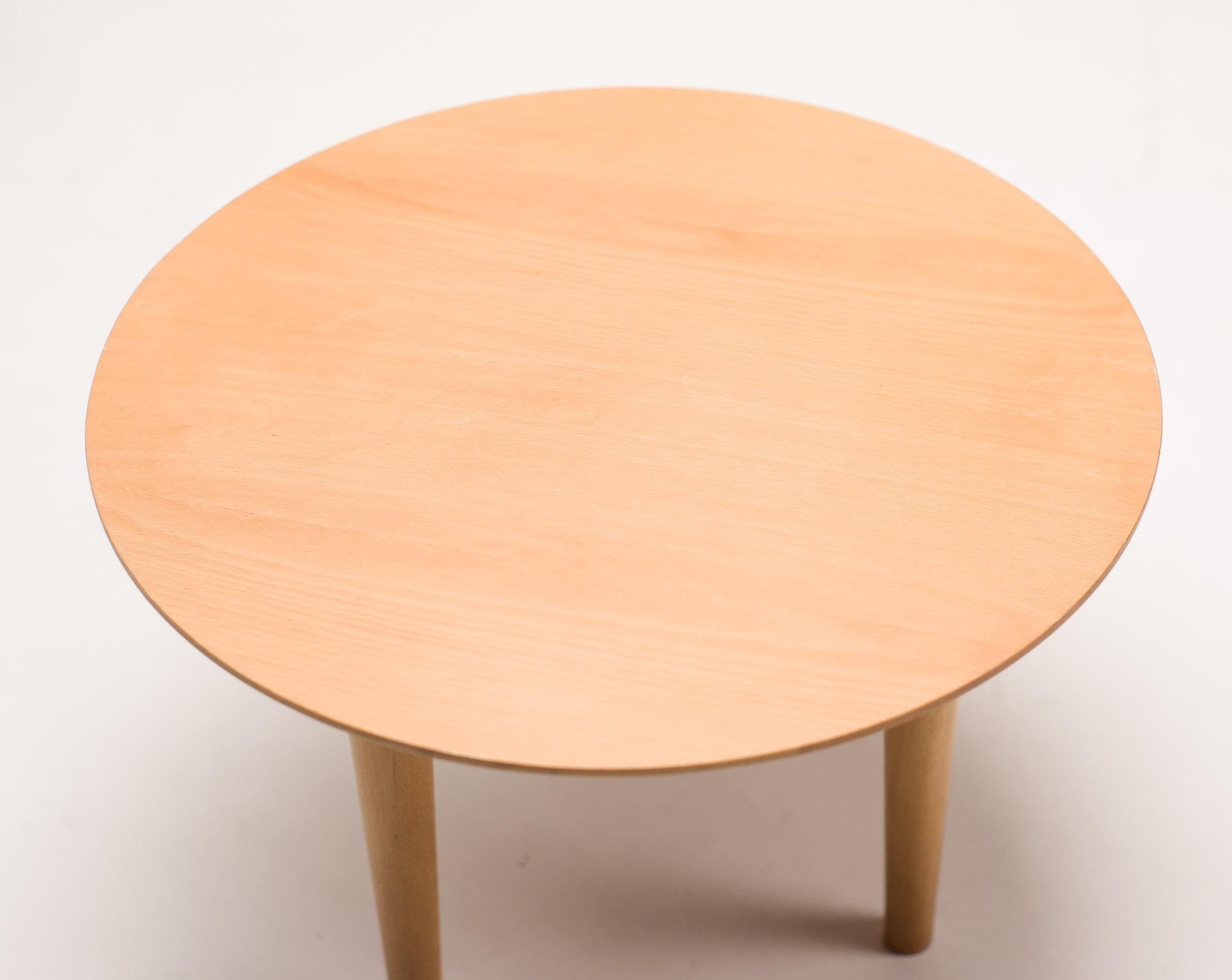 Elegant round solid beech coffee table by Spanish designer Lluis Clotet for Driade. 
The Atlantide collection. Marked with label.
 