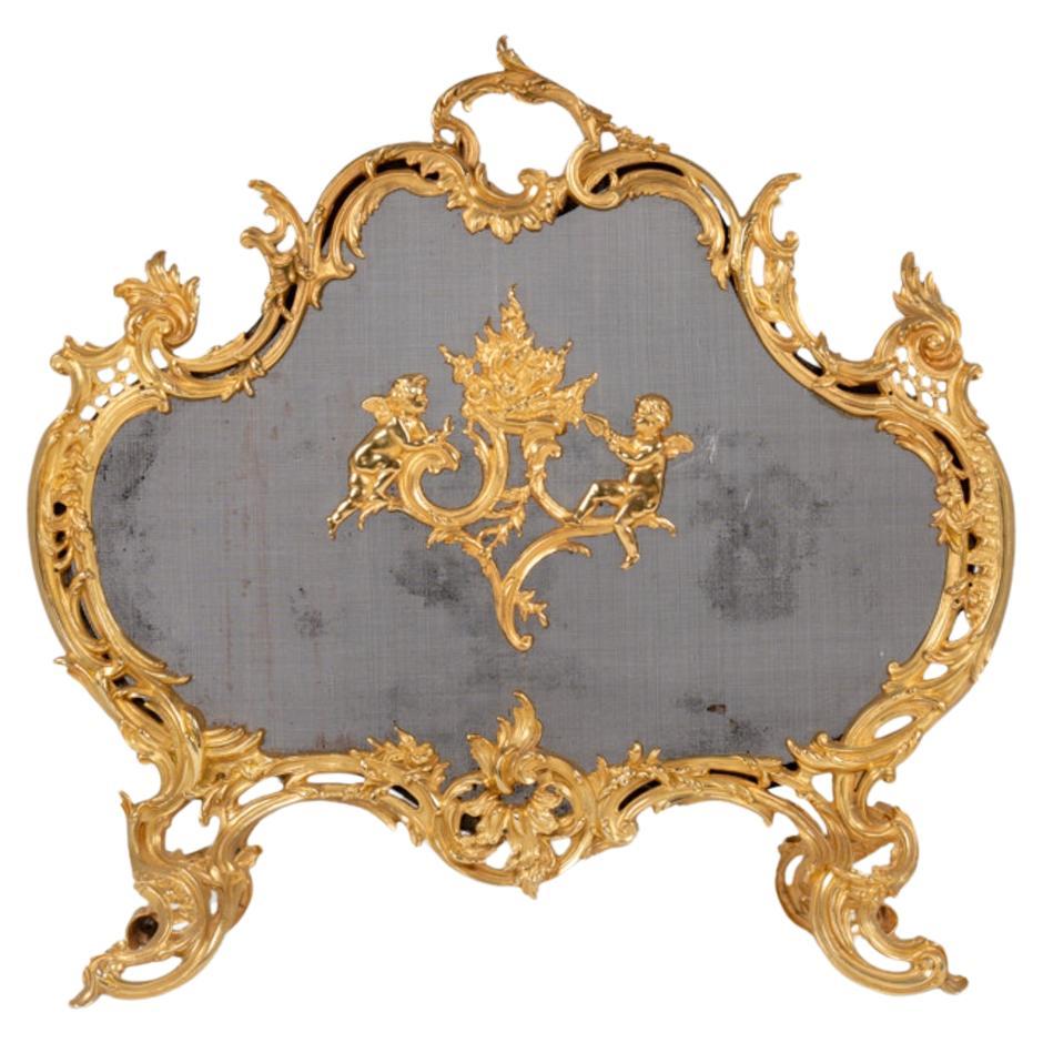Pare-feu en bronze doré de style Louis XV. Circa 1880. For Sale