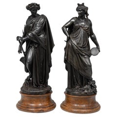 Pareja de esculturas francesas en calamina, siglo XIX