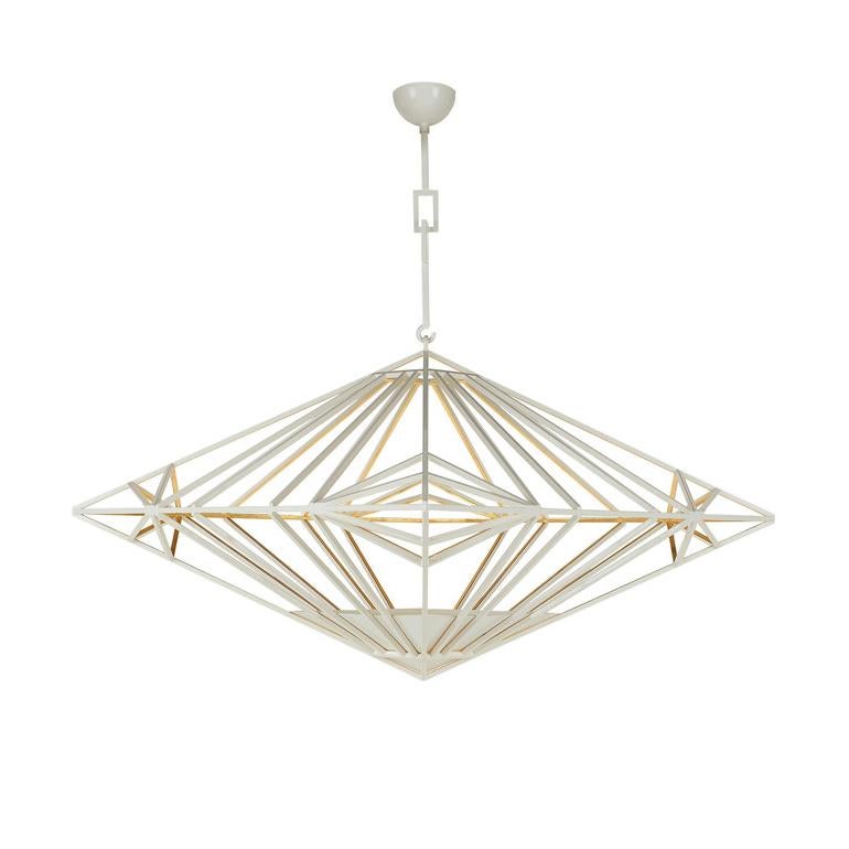 Square pendant
Shown in un-lacquered brass
One in stock available

Measures: Large W 36” x D 36” x H 24”
OAD: to be specified
Diagonal dimension: 50 7/8”
(1) 100w halogen bulb

 