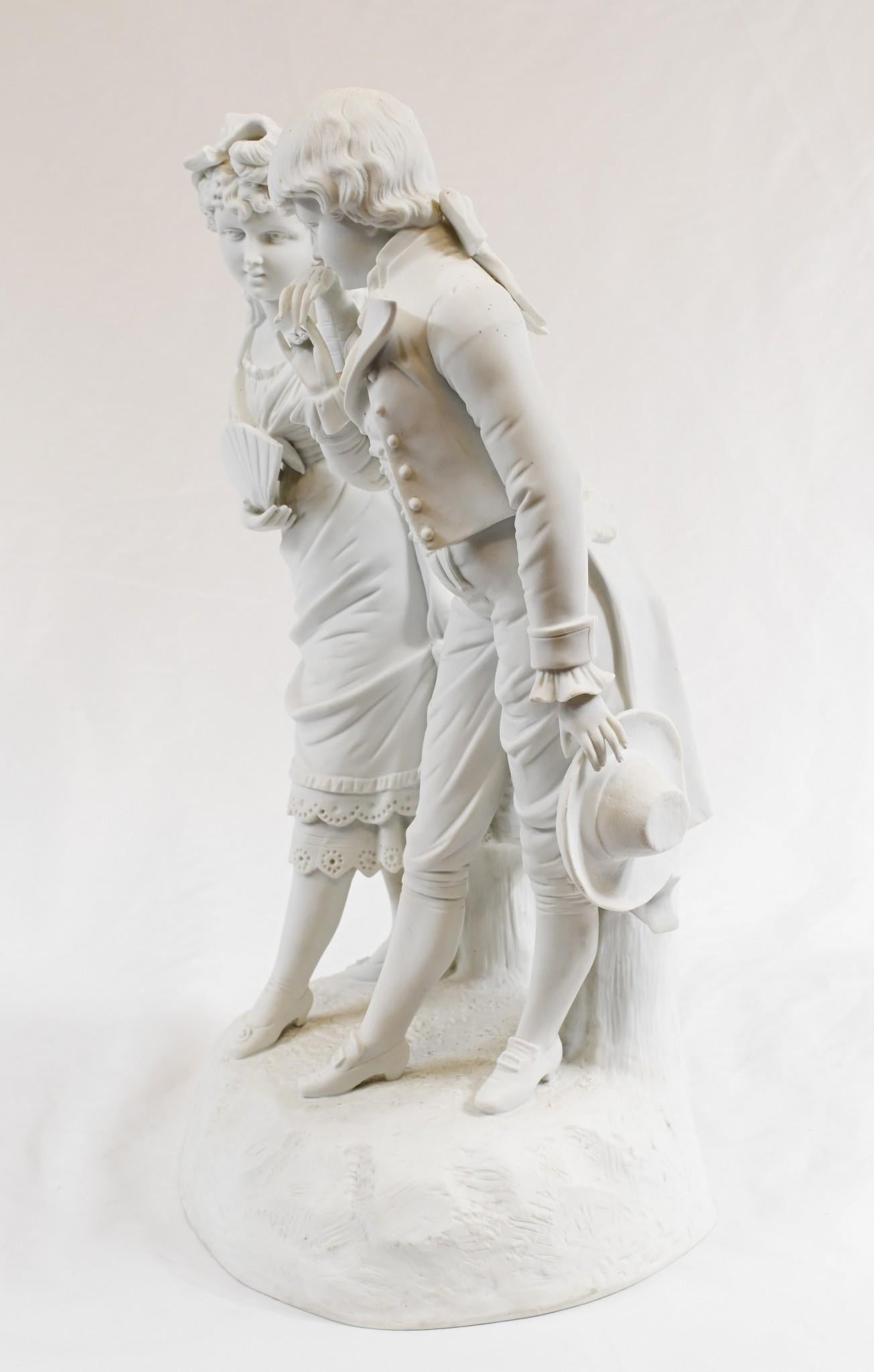 A French pair of young lovers dressed in 18th century clothing in porcelain biscuit ware by Copeland
Highly collectable statue just under two feet tall
Parian is made of biscuit porcelain. With its white color, the material makes an attractive