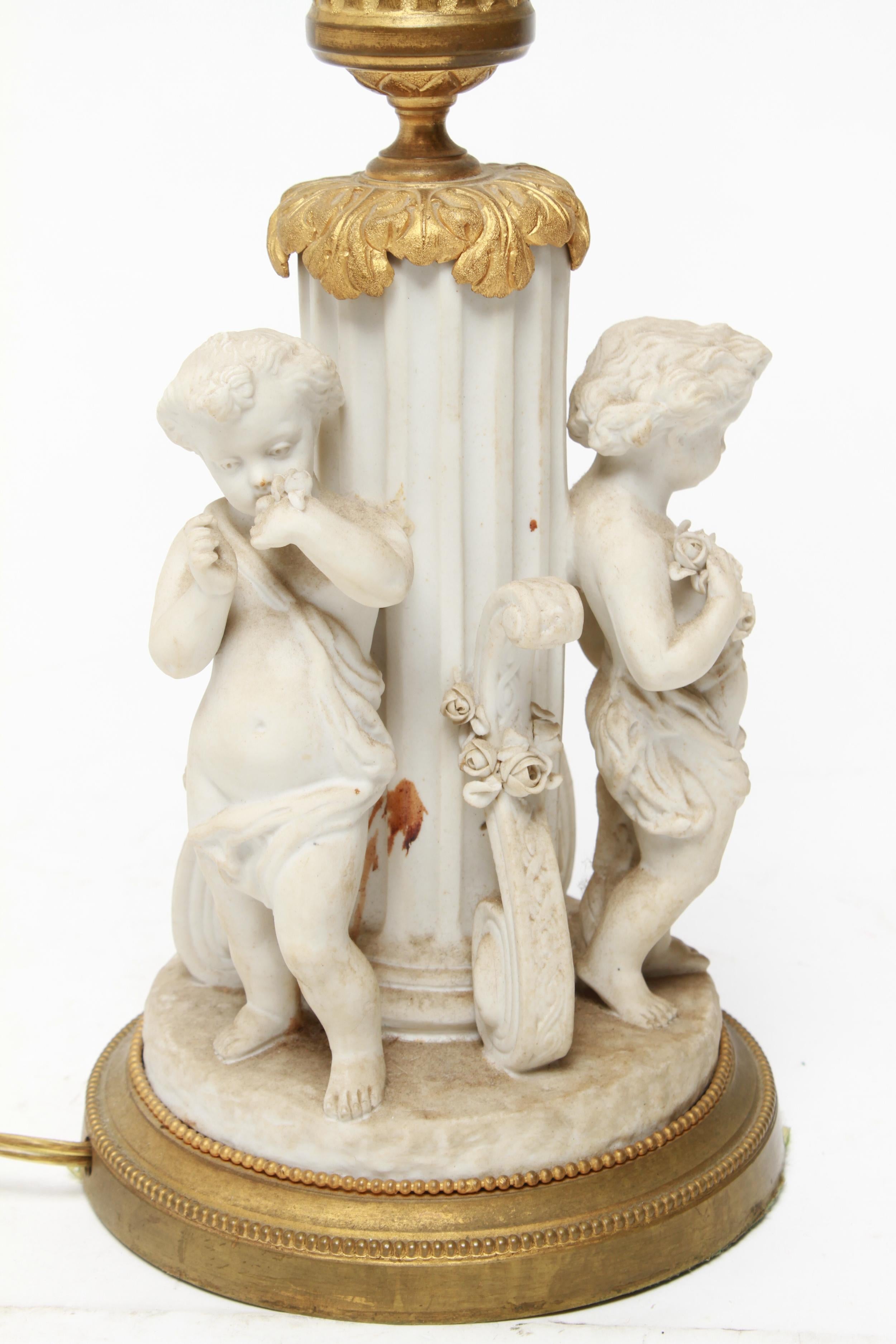 antique porcelain cherub lamp