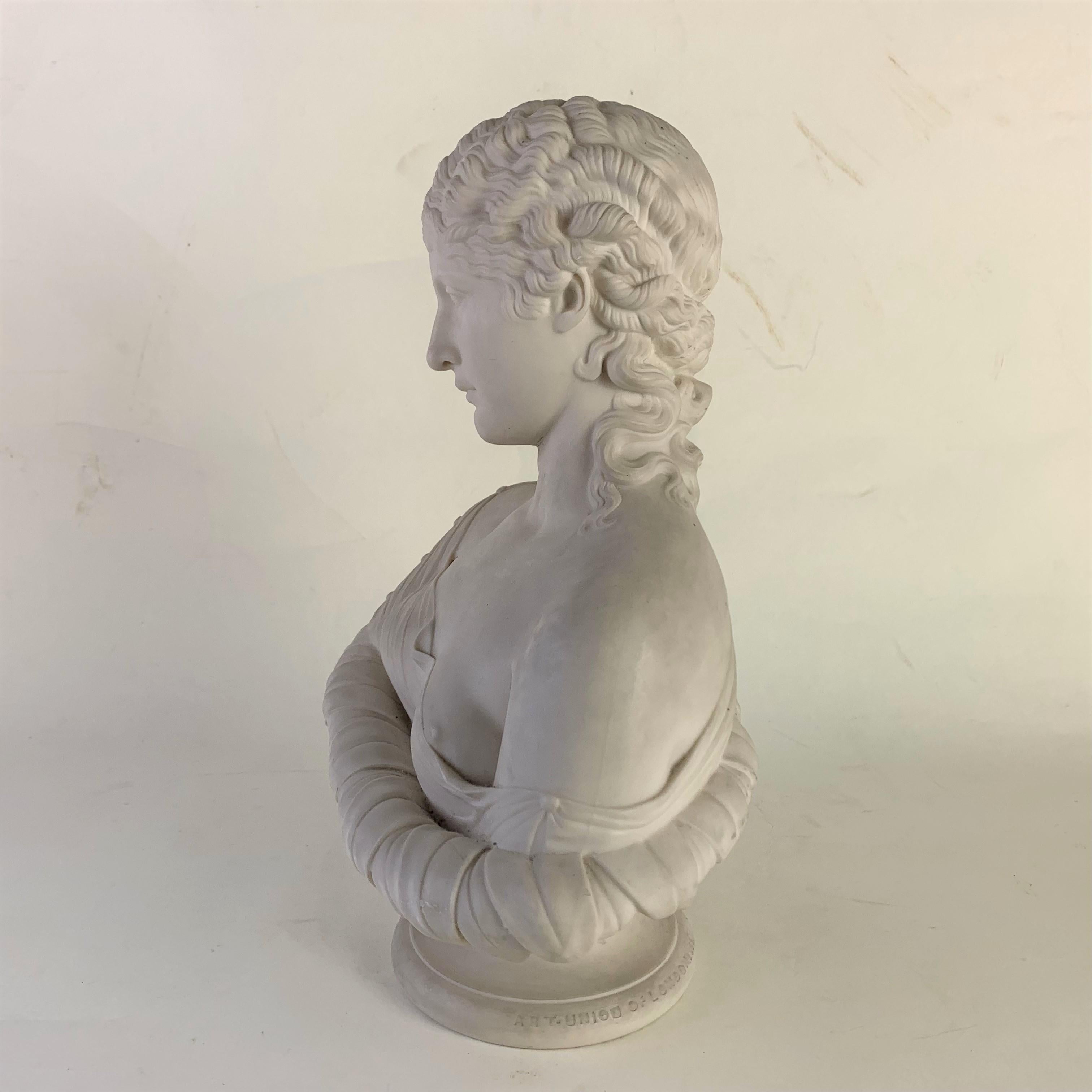 Late 19th century Parian bust of Clytie, a Greek water nymph and symbol of unrequited love.
In the legend Clytie, the deserted lover of Helios the sun, sat staring at the sun, following it throughout each day until eventually she was turned into a