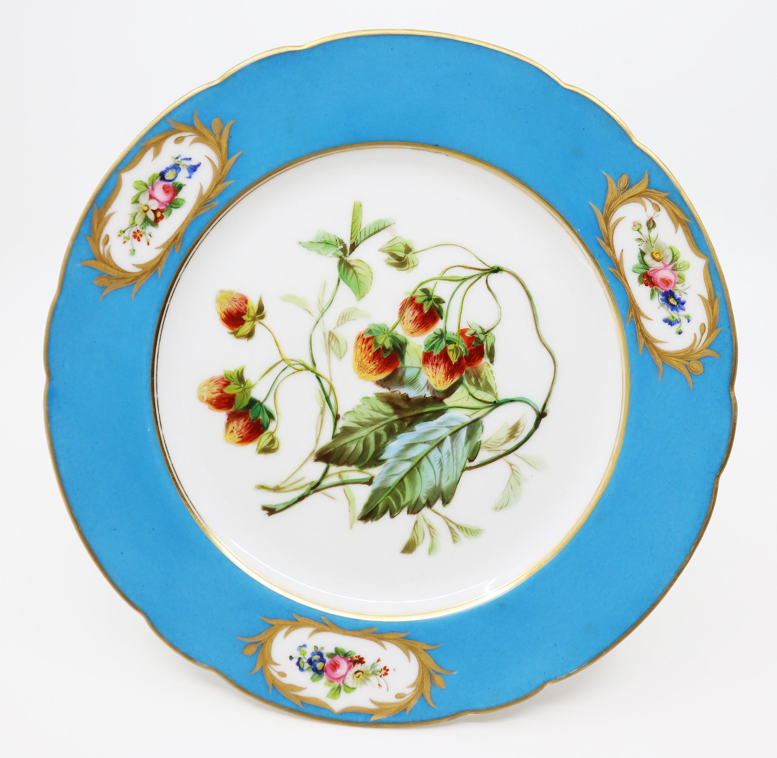 A rare and beautiful 12 dessert plates and one bowl from early 19th century Paris hand painted and gilded porcelain. The plates’ and bowl borders are each painted with three cartouches of variant fruits bouquets in the Sèvres style; the center of