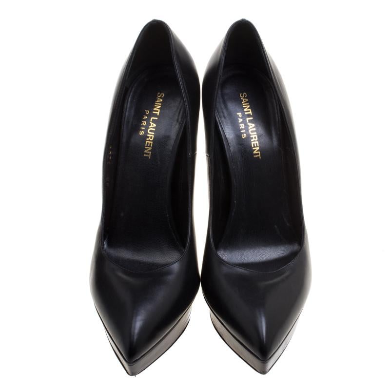 Don't you just wanna grab these pumps and try them on? They're beautiful to look at and versatile in design as well. Crafted from leather, these Saint Laurent pumps carry a sleek exterior, platforms and 14 cm heels that flaunt stud details. Make