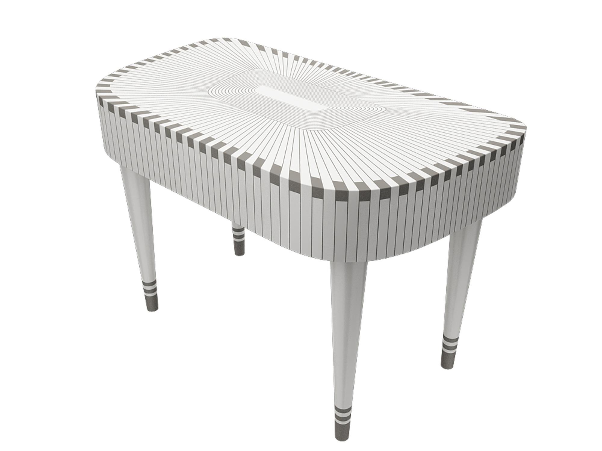 Paris Bureau White and Gray Study Desk Writing Table by Matteo Cibic is an extraordinary console/writing table, with two drawers. It is available in a range of colors, which can be customized according to the space.

India's handicrafts are as