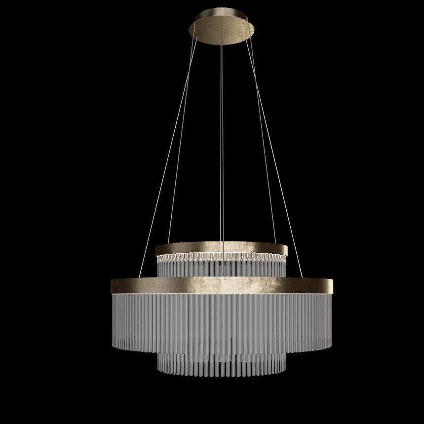 Lampadario Paris di Hugues Chevalier



Il lampadario Paris emana eleganza e sembra fluttuare senza sforzo nell'aria. Il suo design minimalista nasconde una meticolosa lavorazione artigianale, mentre due cerchi concentrici di bacchette in vetro di