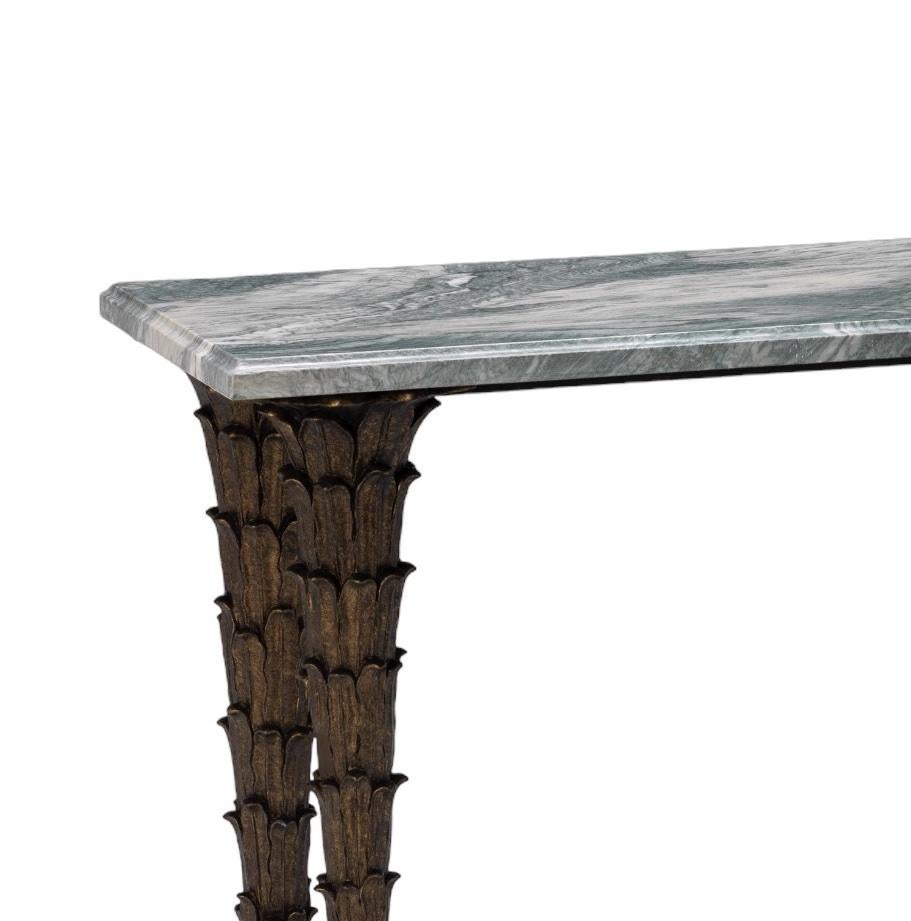 Paris console ebonised mahogany side table with full acanthus carved tapering legs supporting a marble top.