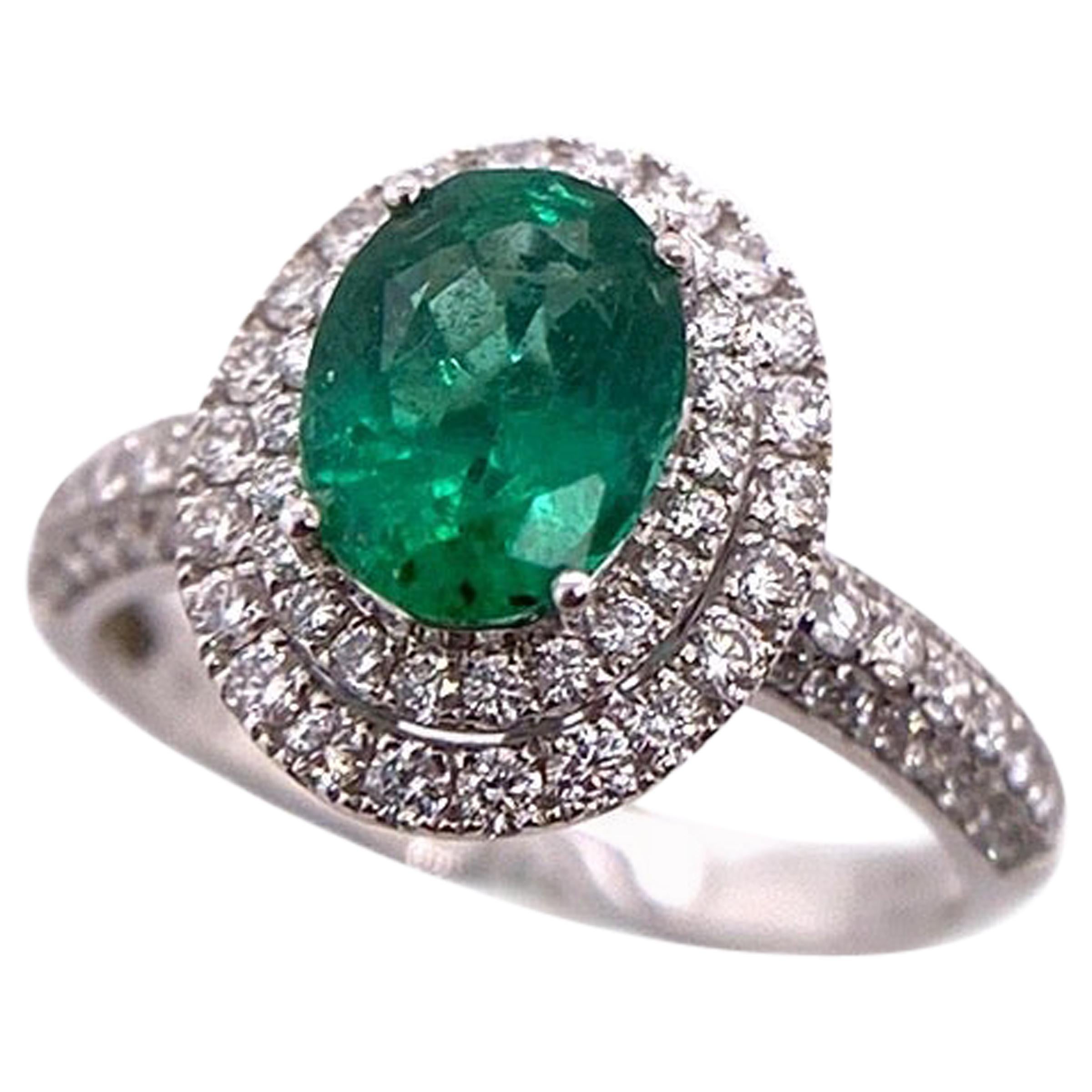 Paris Craft House 1.10 Carat Oval Emerald Diamond Halo Ring in 18 Karat Gold For Sale