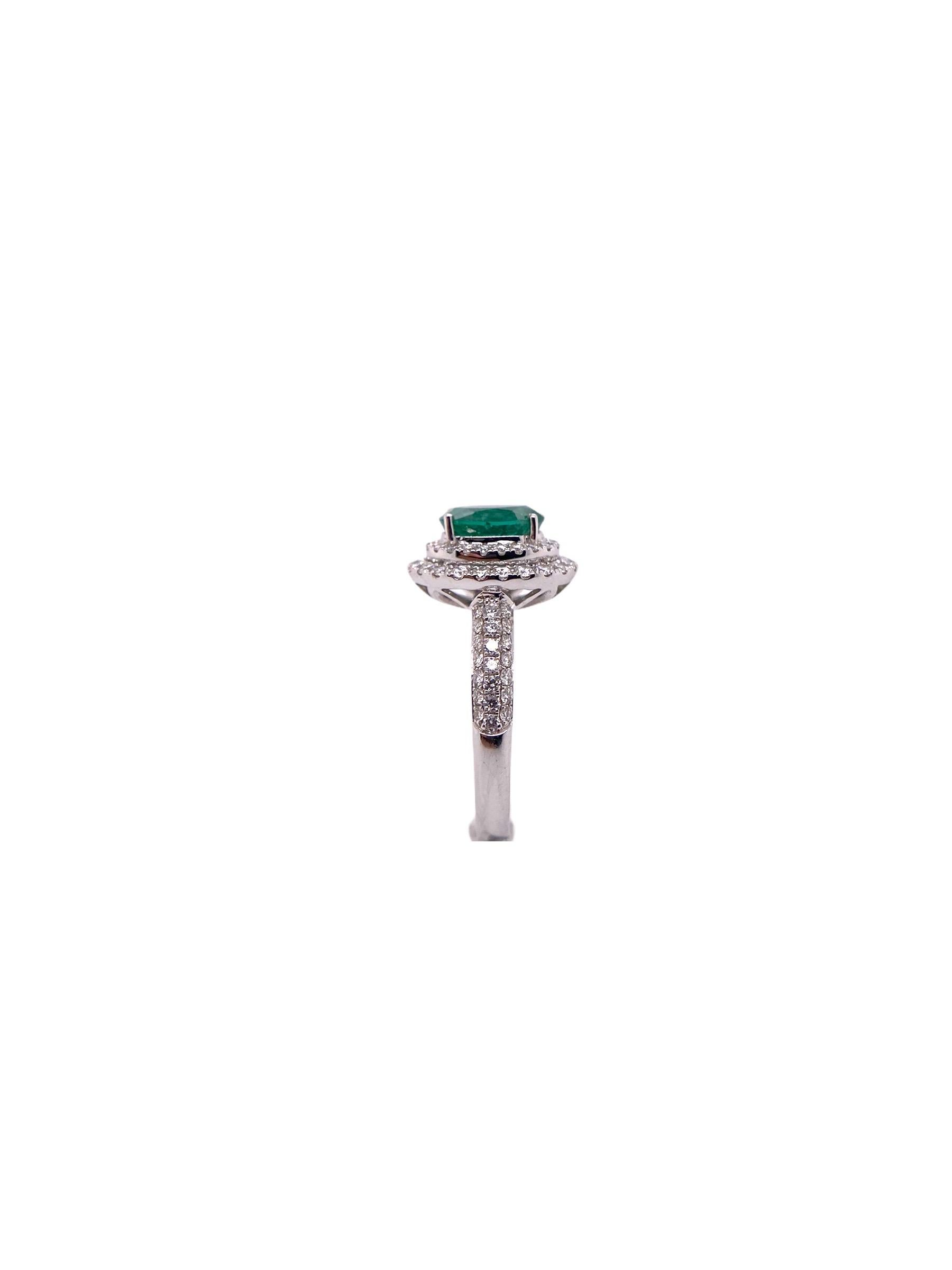 Modern Paris Craft House 1.10 Carat Oval Emerald Diamond Halo Ring in 18 Karat Gold For Sale