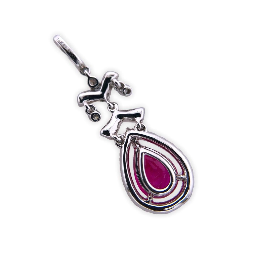 PARIS Craft House unique Chandelier Pendant. Crafted in 18K White Gold, this pendant features a lustrous 1.31ct, Pear-cut Ruby. Like a tear drop it drips, the stone sits and hang on its body of art inspired by royal chandeliers of The Buckingham