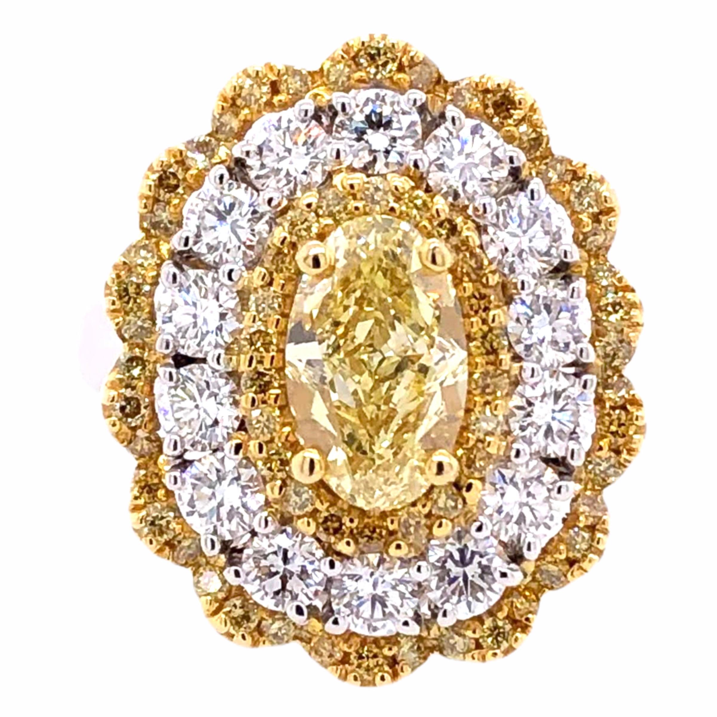 PARIS Craft House 1.32ct Fancy Yellow Diamond Cocktail Ring in 18K White/Yellow Gold. This ring and its stones are detachable and could convert into a beautiful pendant. *Chain not included*

- 1 Oval-cut Fancy Yellow Diamond/1.32ct
- 64 Round