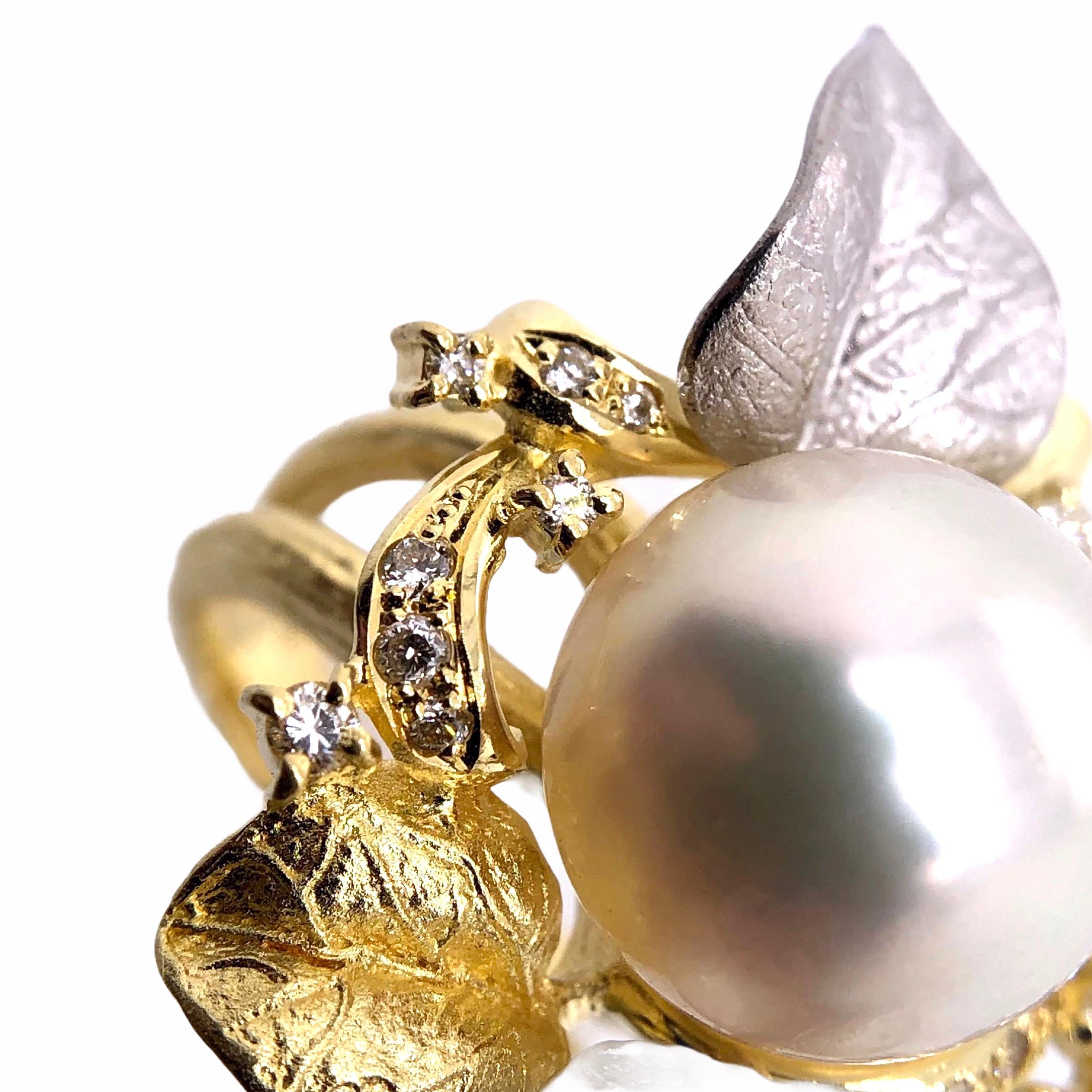 PARIS Craft House 13mm Pearl Diamond Ring in 18 Karat Yellow Gold.

- 1 Pearl/13mm
- Diamonds/0.28ct
- 18K Yellow Gold/16.12ct

Designed and crafted at PARIS Craft House.