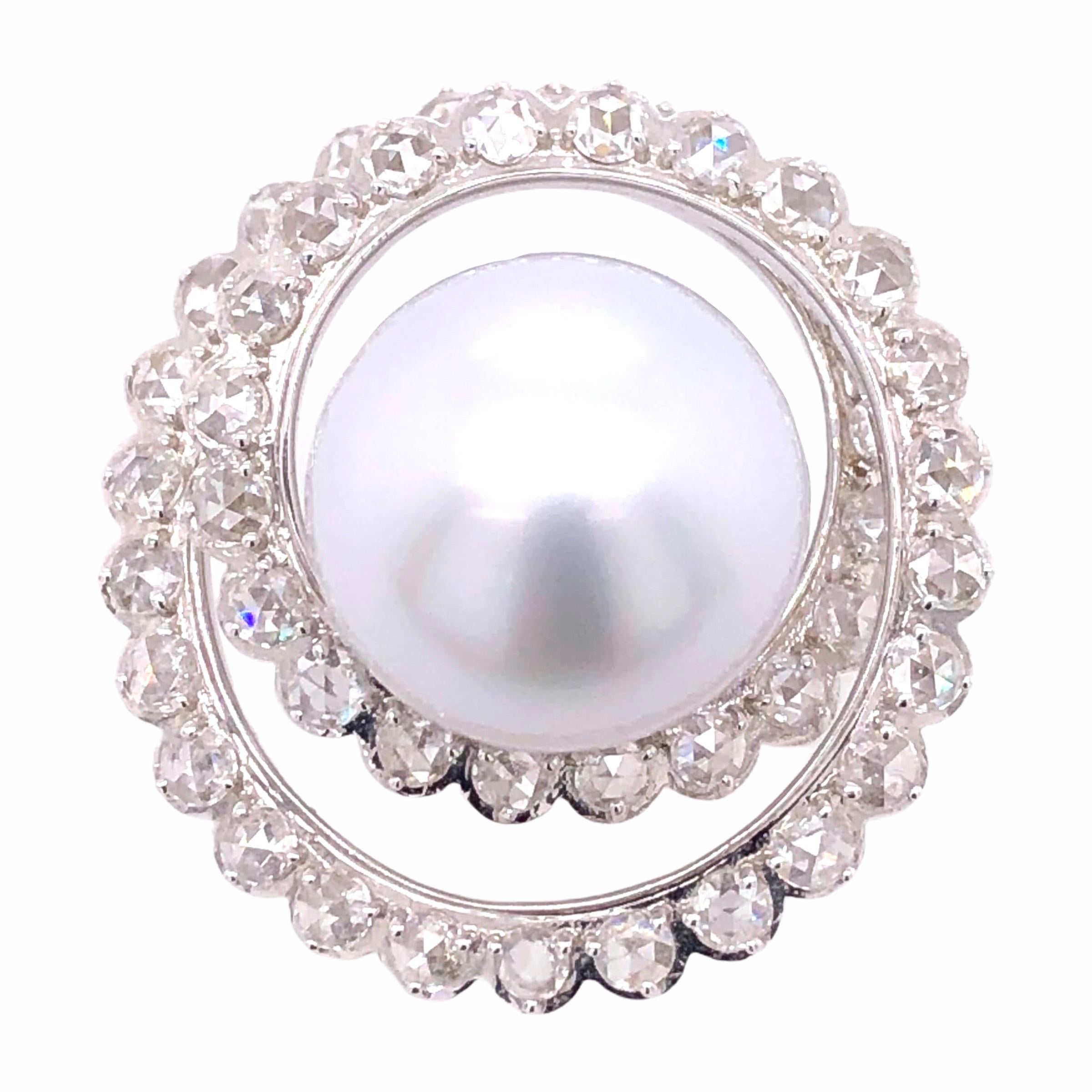 PARIS Craft House 14mm South Sea Pearl Diamond Pendant in 18 Karat White Gold.

- South Sea Pearl/14mm
- Round Diamonds
- 18K White Gold

Designed and crafted at PARIS Craft House.