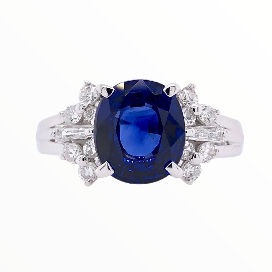 PARIS Craft House 2.13ct Blue Sapphire Diamond Cocktail Ring in Platinum.

- 1 Oval-cut Blue Sapphire/2.13ct
- 14 Mixed-cut Diamonds/0.31ct
- PT900 Platinum/5.70g
- Ring size/US 5

Designed and crafted at PARIS Craft House.