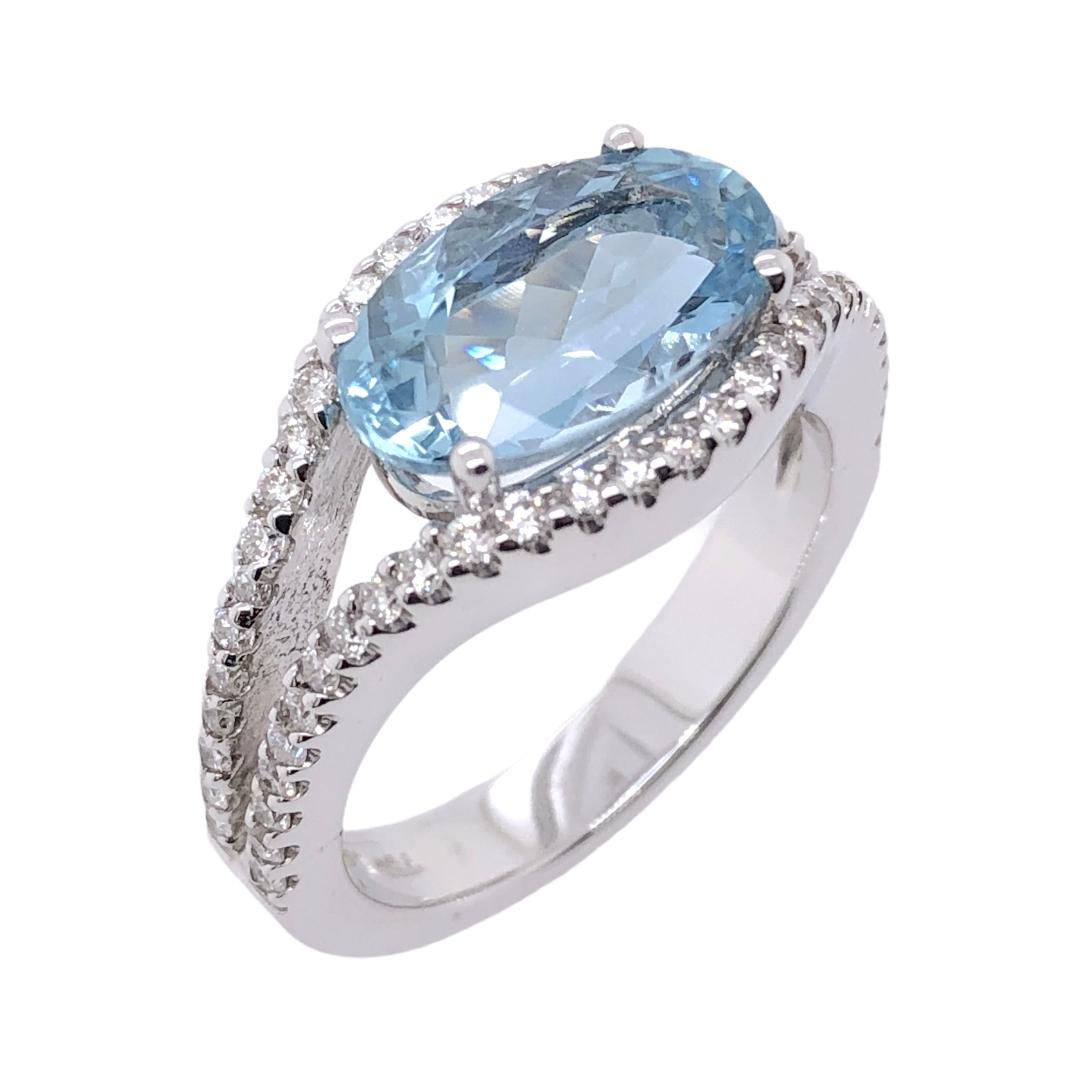 PARIS Craft House 2.81ct Aquamarine Diamond Ring in 18 Karat White Gold.

- 1 Oval-cut Aquamarine/2.81ct
- 58 Round Diamonds/0.55ct
- 18K White Gold/5.98g

Designed and crafted at PARIS Craft House.