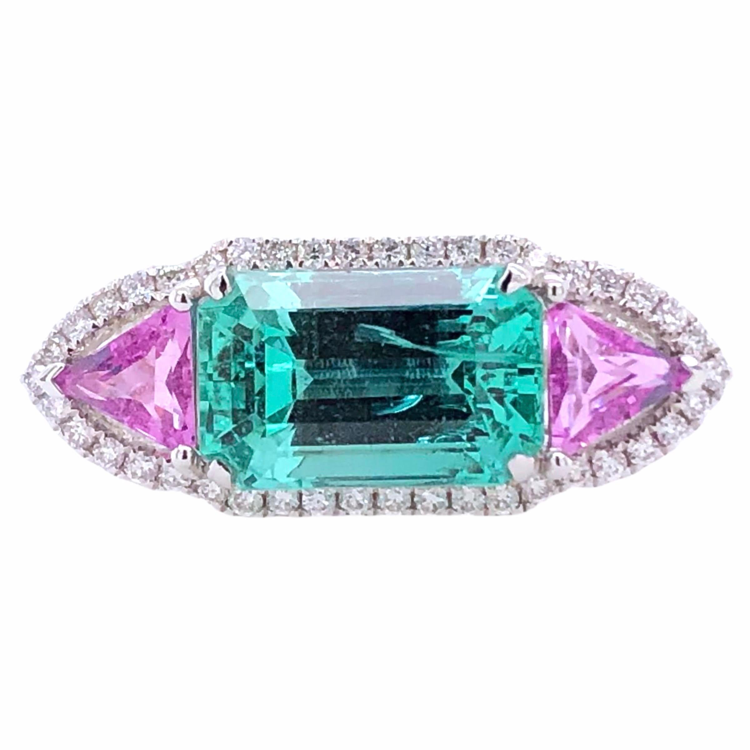 PARIS Craft House 3.24ct GRS Certified Emerald Pink Sapphire Diamond Ring in 18 Karat White Gold.

- 1 GRS Certified Emerald/3..24ct
- 2 Pink Sapphires/1.09ct
- 102 Round Diamonds/0.52ct
- 18K White Gold

Designed and crafted at PARIS Craft House.