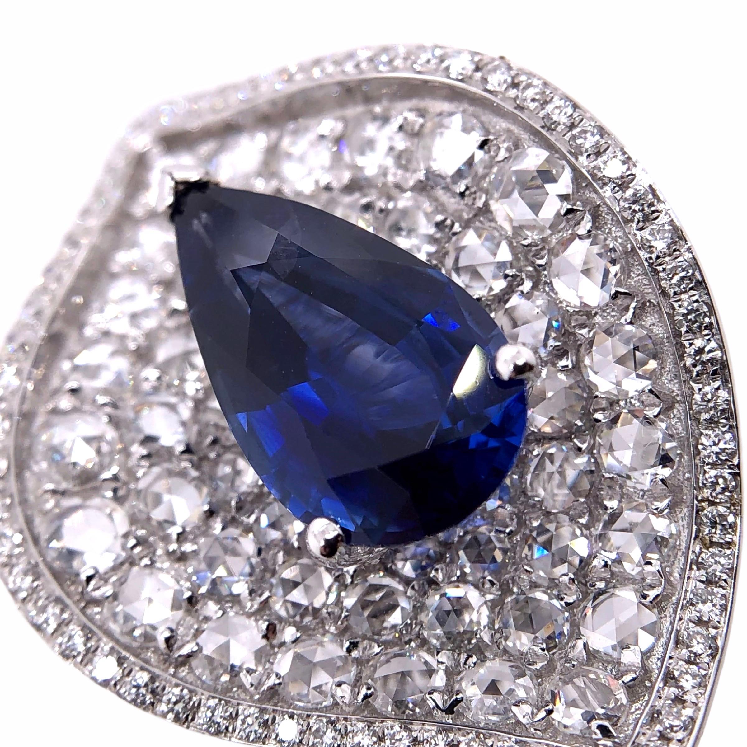 PARIS Craft House 4.47ct Blue Sapphire Diamond Cocktail Ring in 18 Karat White Gold.

- 1 Pear-cut Blue Sapphire/4.47ct
- 56 Rose-cut Diamonds/2.16ct
- 116 Round Diamonds/0.34ct
- 18K White Gold/13.02g

Designed and crafted at PARIS Craft House.