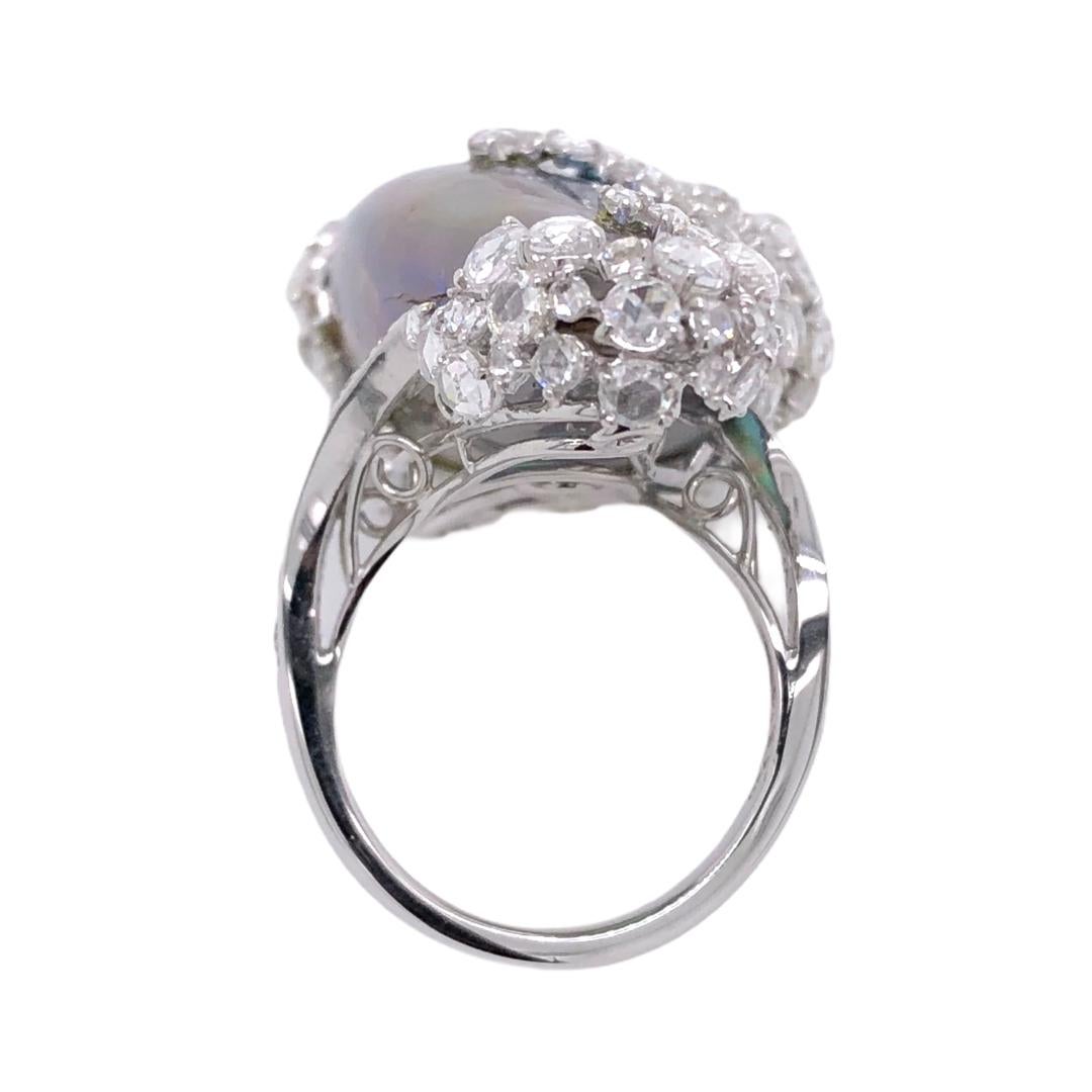 PARIS Craft House 49.68ct GIA Certified Abalone Pearl Diamond Ring in 18 Karat White Gold.

- 1 GIA Certified Abalone Pearl/49.68ct
- 85 Rose-cut Diamonds/3.40ct
- 15 Round Diamonds/0.40ct
- 18K White Gold/11.34g
- Ring size/US 6.5

Designed and