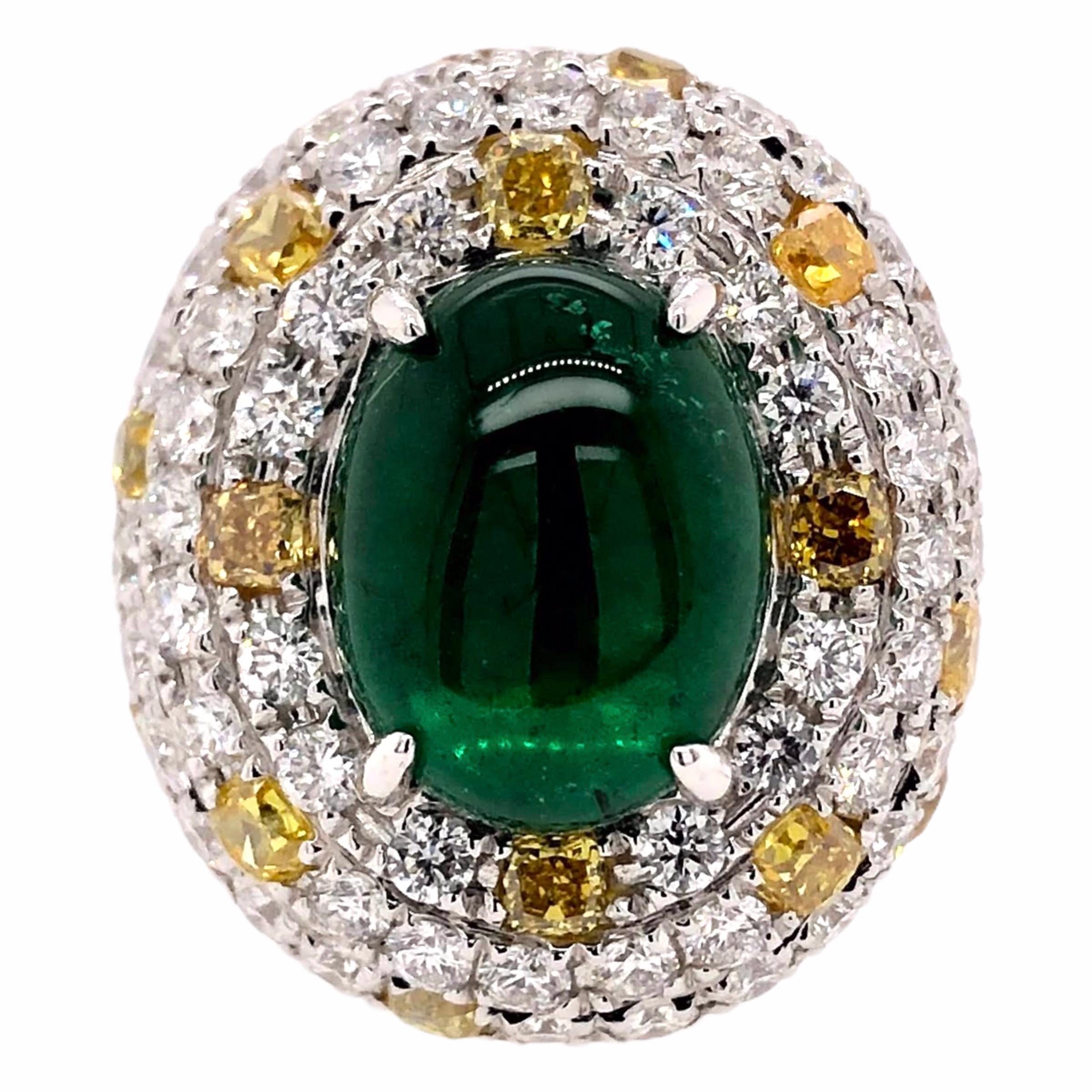 PARIS Craft House 5.31ct Cabochon Emerald Yellow Diamond Ring in 18 Karat White Gold.

- 1 Cabochon Emerald/5.31ct
- 18 Yellow Diamonds/1.52ct
- 78 Round Diamonds/2.24ct
- 18K White Gold/13.48g

Designed and crafted at PARIS Craft House.