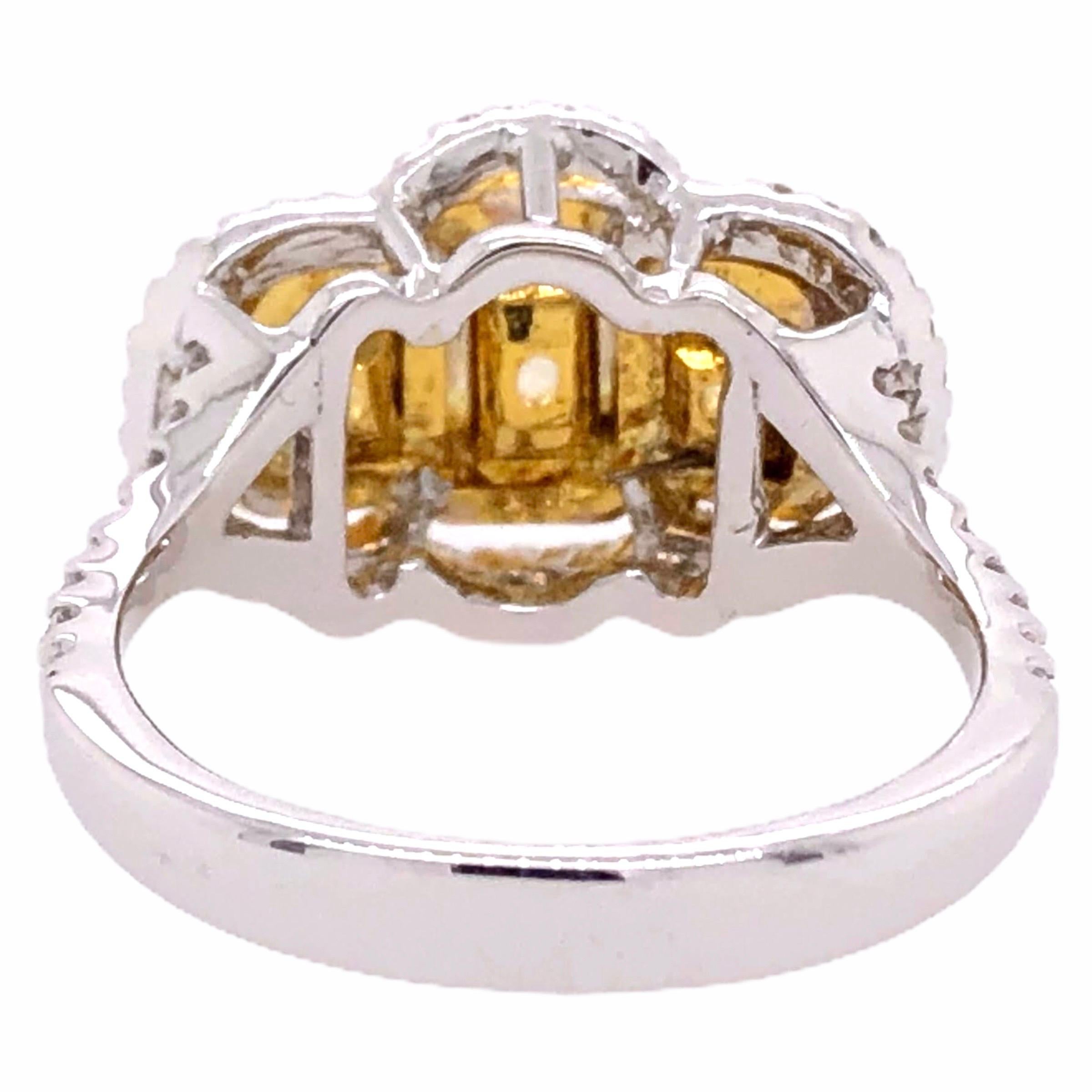 Cushion Cut Paris Craft House Fancy Yellow Diamond Three-Stone Ring in 18 Karat Gold For Sale