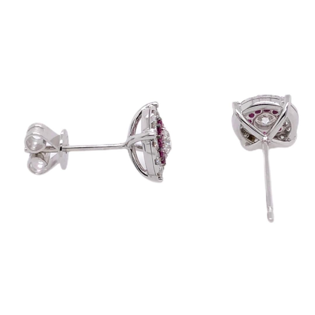 PARIS Craft House Ruby Diamond Earrings. Featured in the article is this dreamy diamond stud earrings crafted of 1 Round cut Diamond on each side weighing a total of 0.23ct. They are accompanied by 24 Round Diamonds and 24 scarlet Round Rubies, set