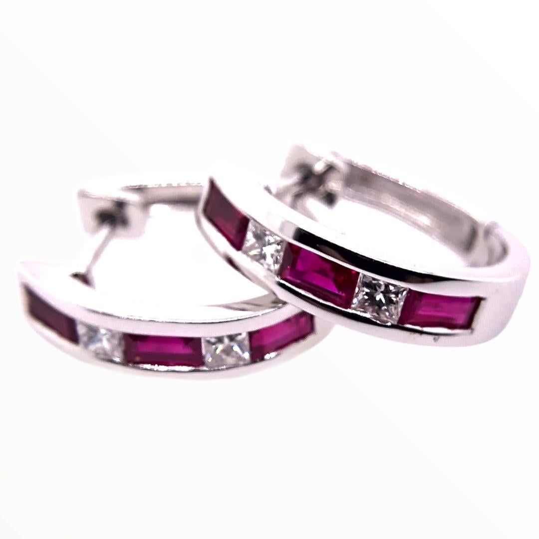 PARIS Craft House Ruby Diamond Hoop Earrings. Featured in this article are these lustrous wine red Rubies done in Baguette cutting. Crafted in 18 Karat White Gold, they are adorned with Baguette Diamonds of matching size and cuts. These stones are
