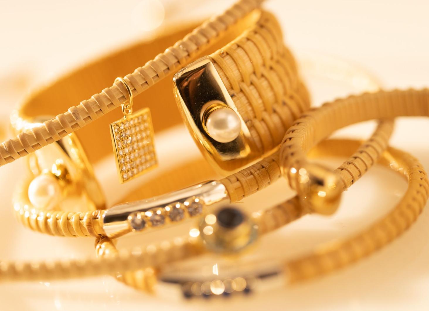 Nantucket Lightship jewelry is a tradition in New England. This handmade cuff celebrates the tradition with a modern esthetic by adding gold and Akoya pearls. Thick natural cain & rattan cuff with 10K yellow gold caps and 22K yellow gold pearl