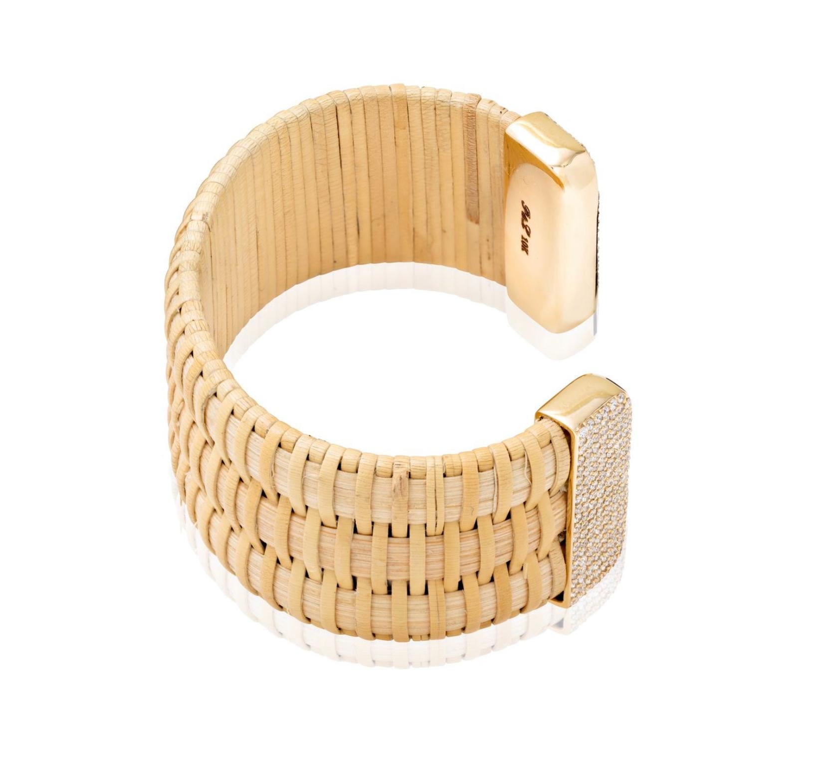 Nantucket Lightship Basket jewelry is a tradition in New England. This cuff follows the tradition of the weaving with a modern esthetic by adding gold and diamond caps. Natural cain & rattan cuff with 10K yellow gold caps and 1.2mm SI1 - SI2