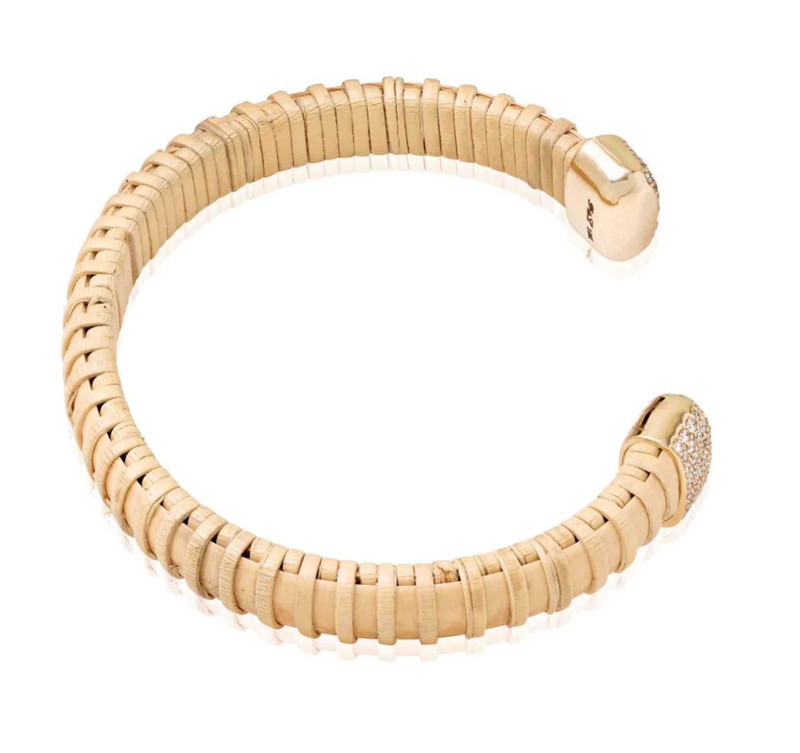 Nantucket Basket Lightship jewelry is a tradition in New England. This handmade cuff celebrates the tradition with a modern esthetic by adding gold and diamonds. Thin natural cain & rattan cuff with 10K yellow gold caps, and 1.2mm SI1 - SI2 diamonds
