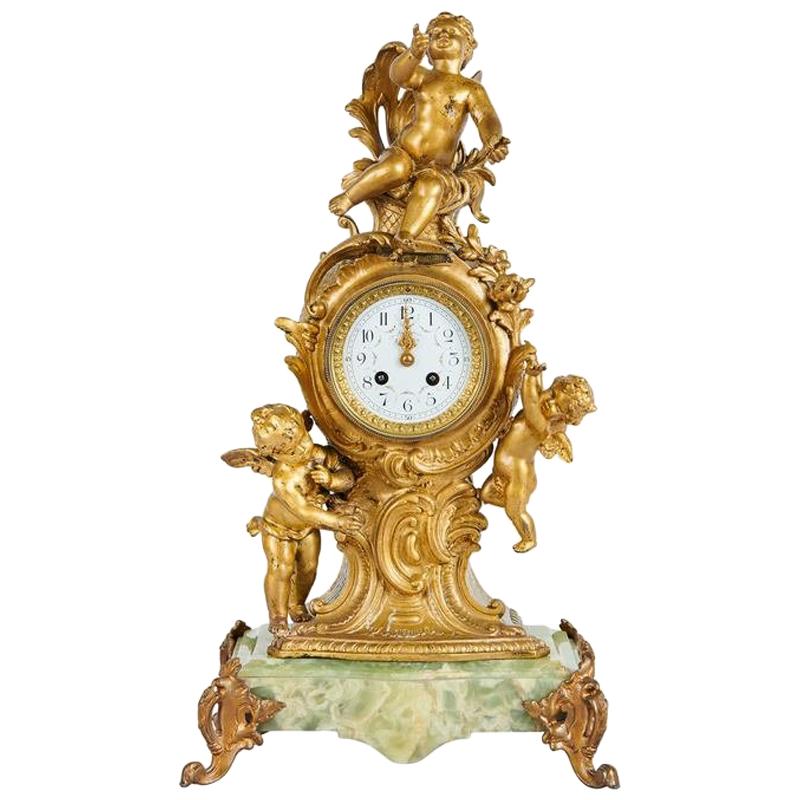 Paris Ormolu Chérub in Gilt Bronze and Onyx Mantle Clock, 19th Century For Sale