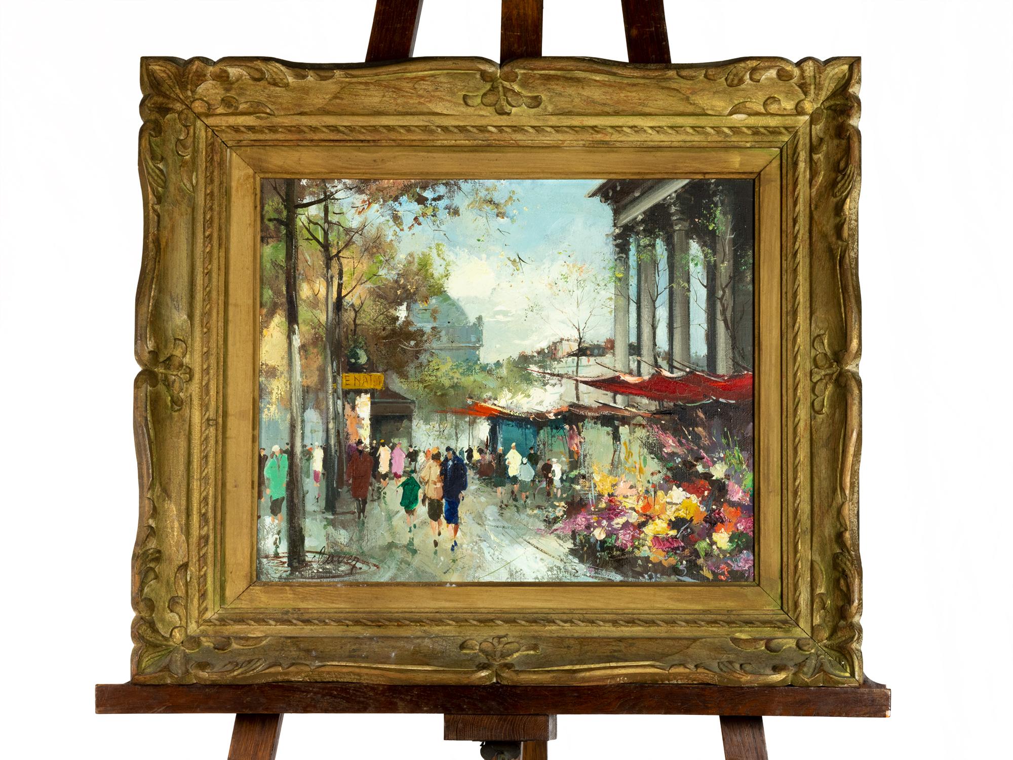 A vibrant Post-Impressionist painting of a Parisian flower market at Place de la Madeleine, signed by François Claver and dated on the reverse frame. The scene captures the essence of everyday beauty, with colorful flower stands set against the